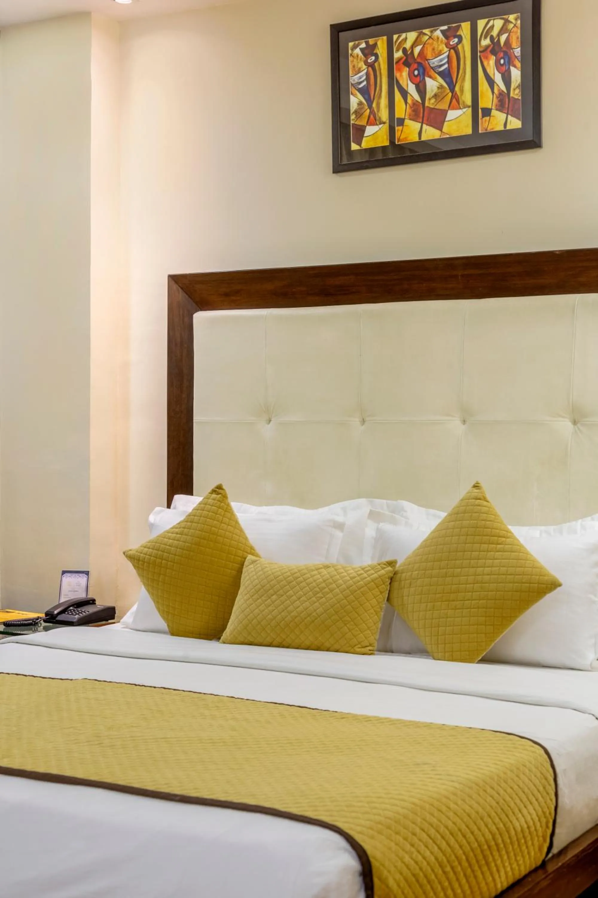 Bed in The Grand Orion - Kailash Colony