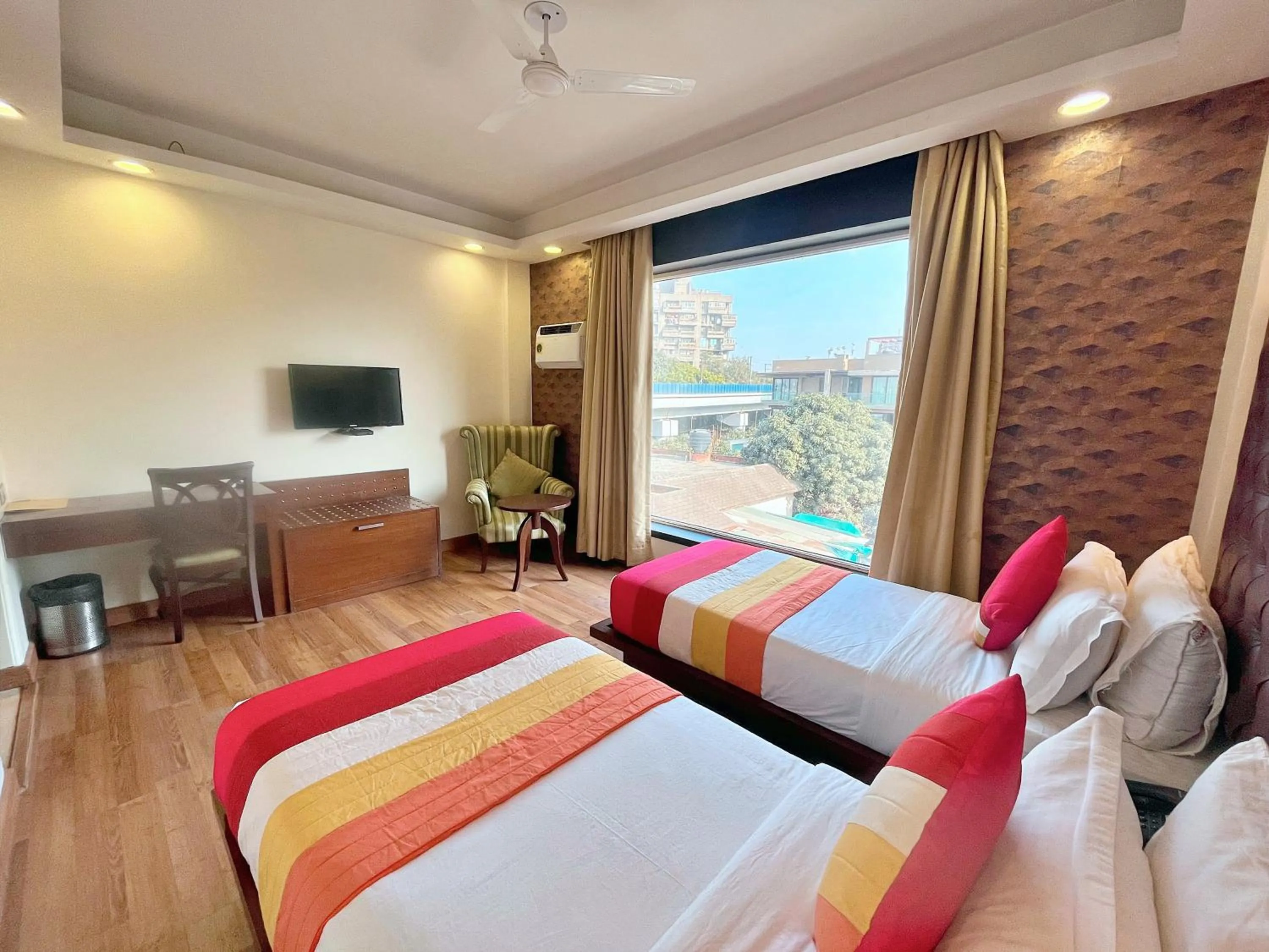 Photo of the whole room, Bed in The Grand Orion - Kailash Colony