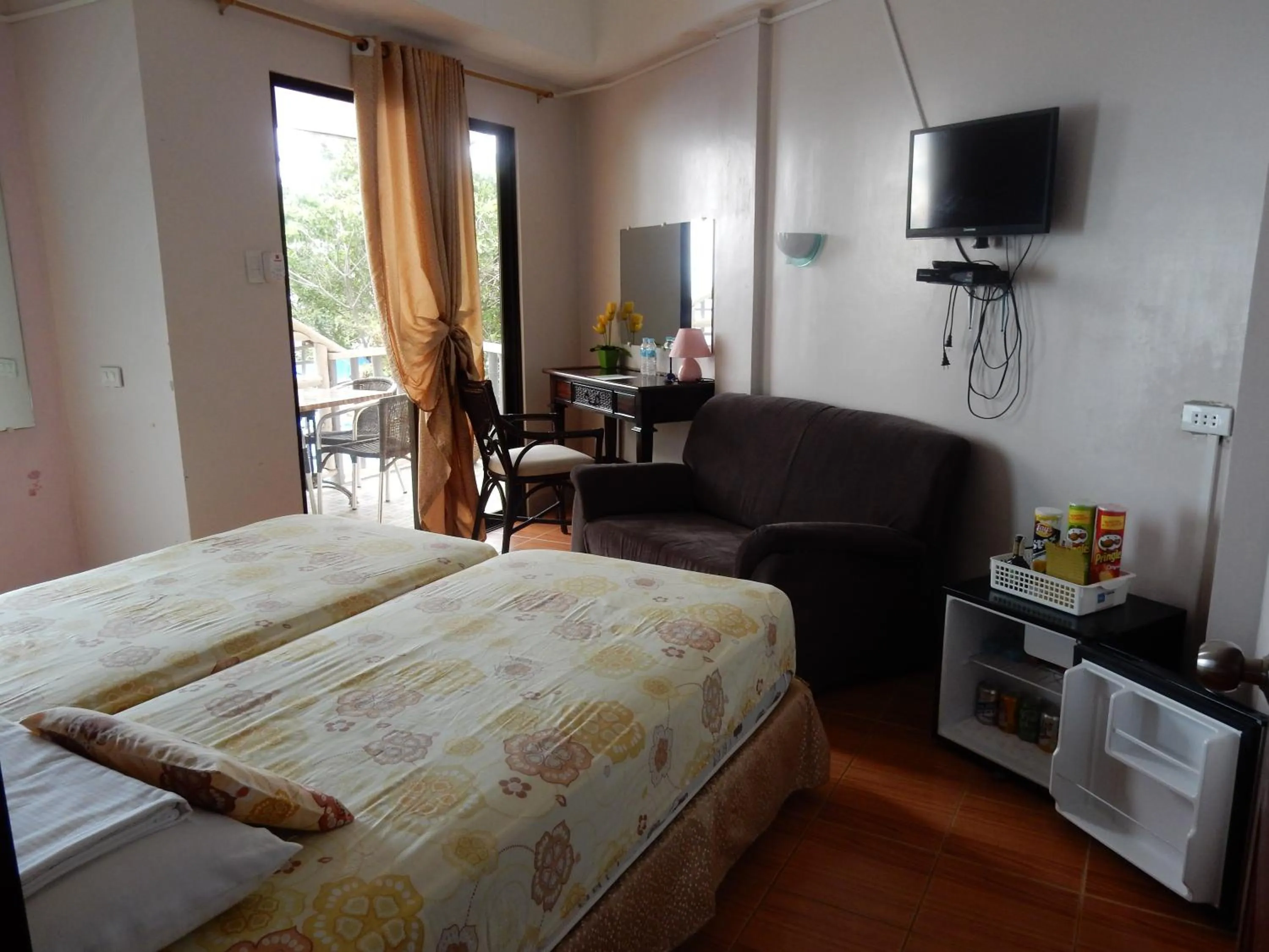 Photo of the whole room, Bed in Oslob Seafari Resort