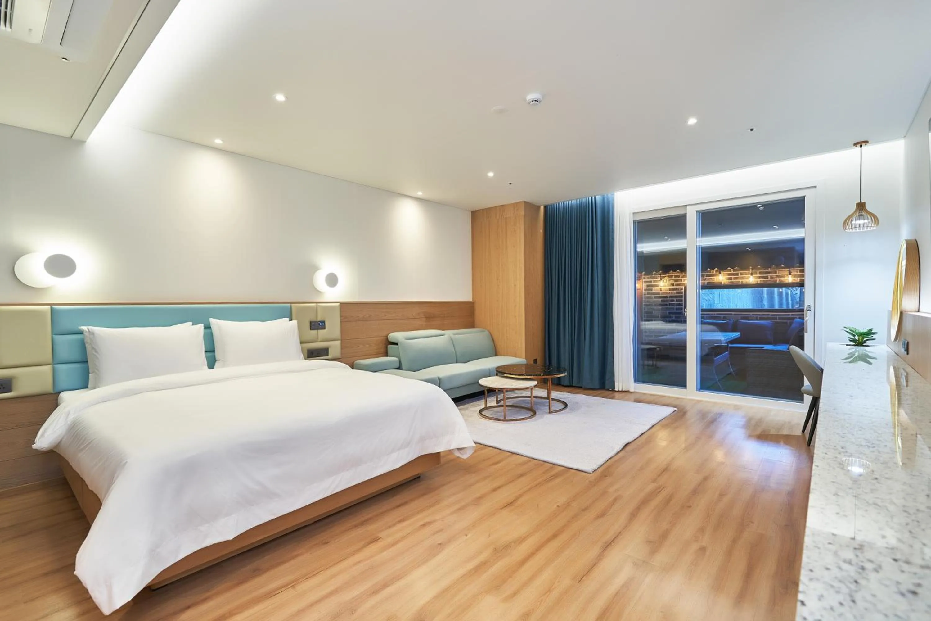 Bed in JN PARK Hotel