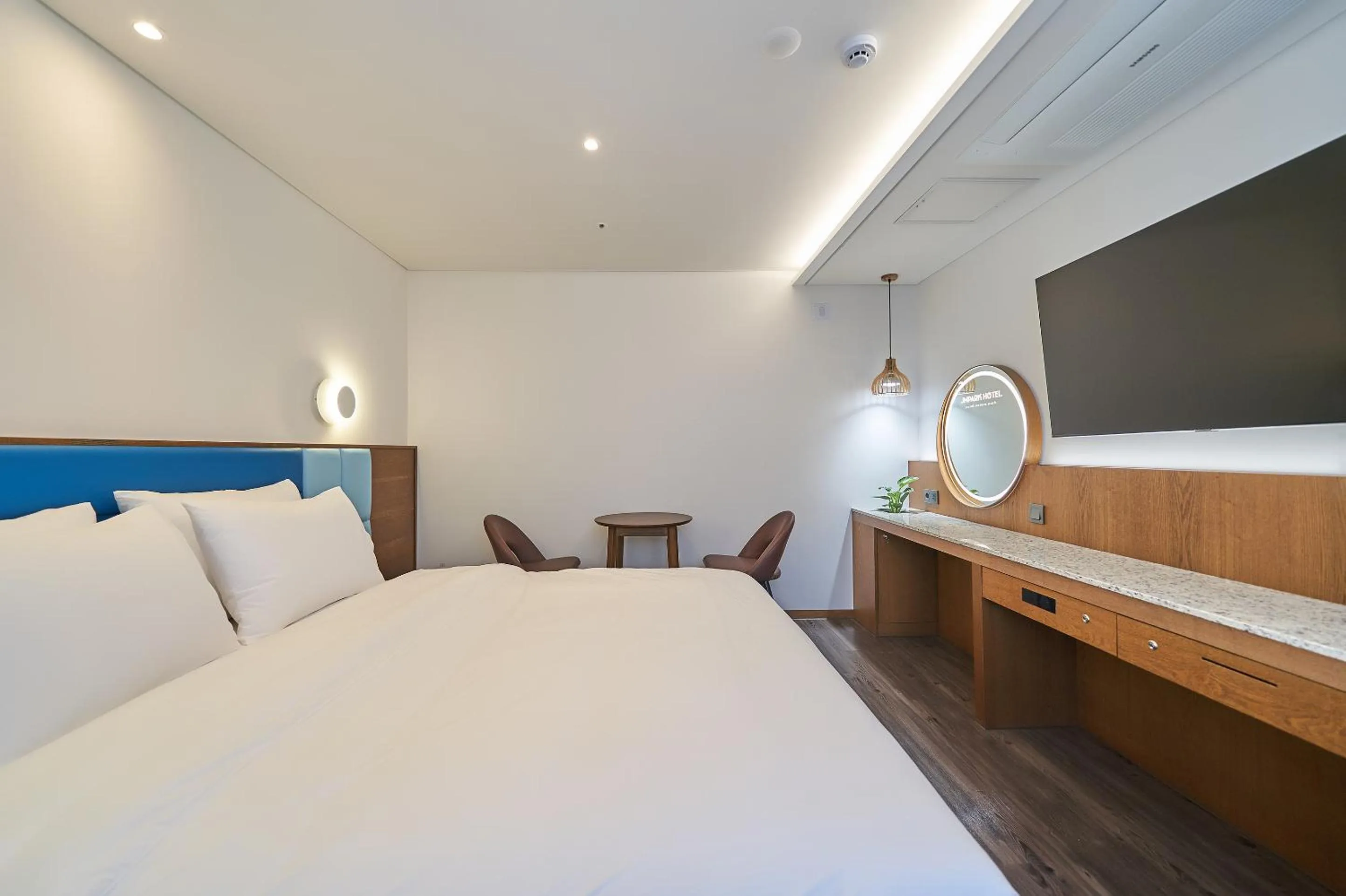 Bed in JN PARK Hotel