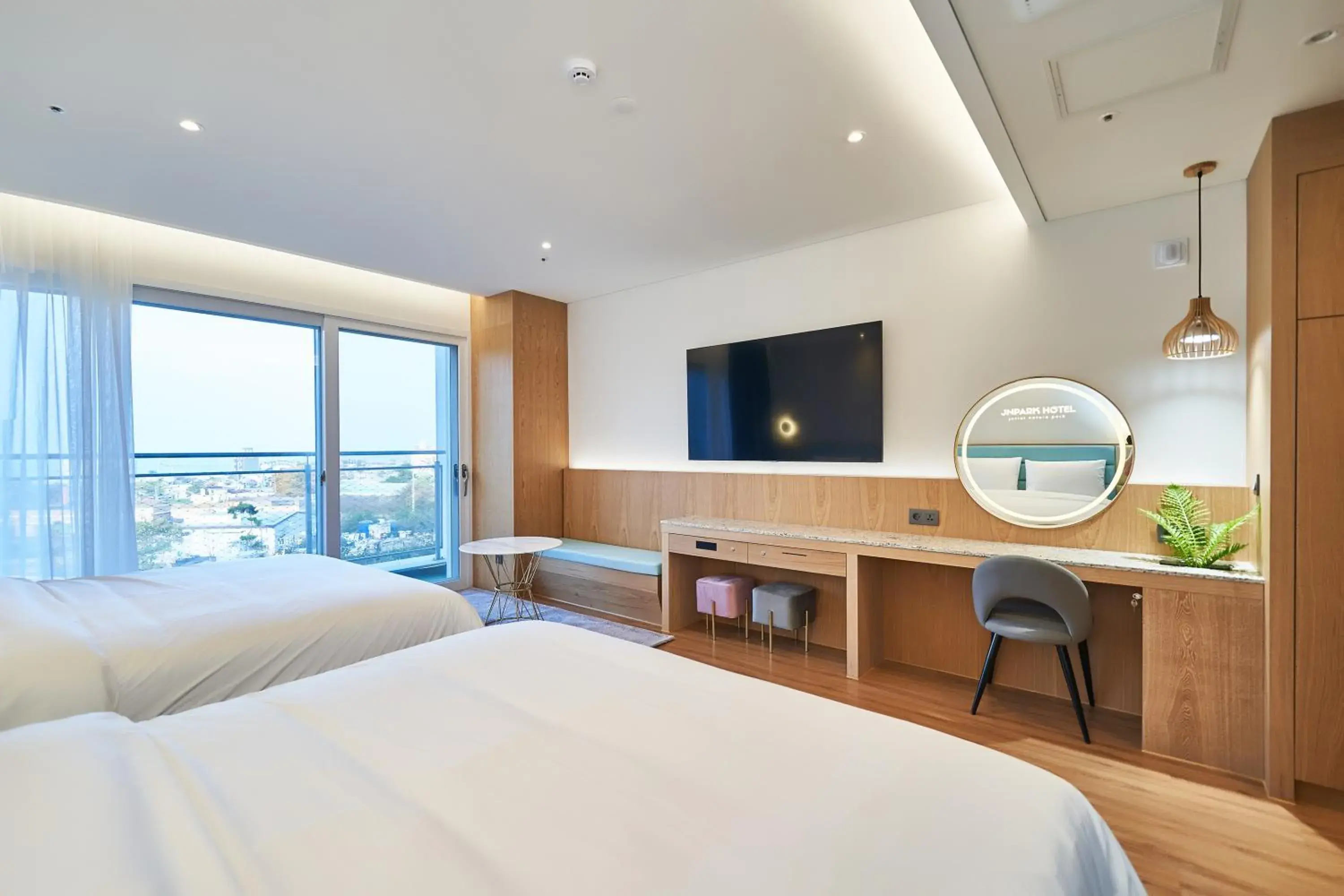 Bed in JN PARK Hotel Bed in JN PARK Hotel