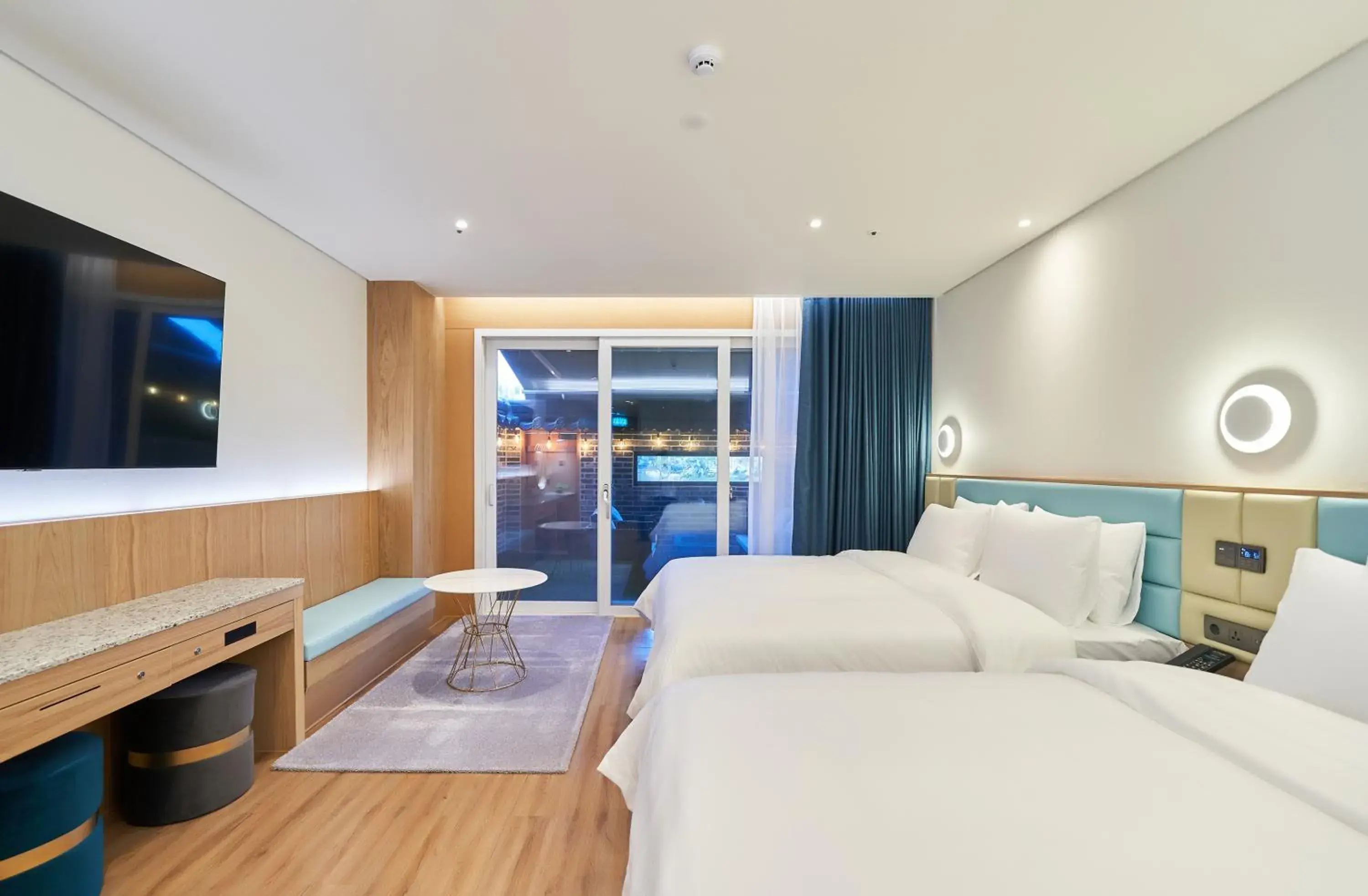 Bed in JN PARK Hotel Bed in JN PARK Hotel