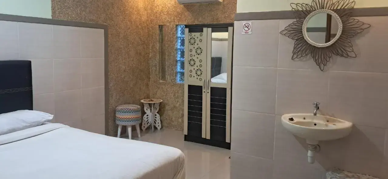 Bed in CALDERA PARK HOMESTAY Syariah Bed in CALDERA PARK HOMESTAY Syariah