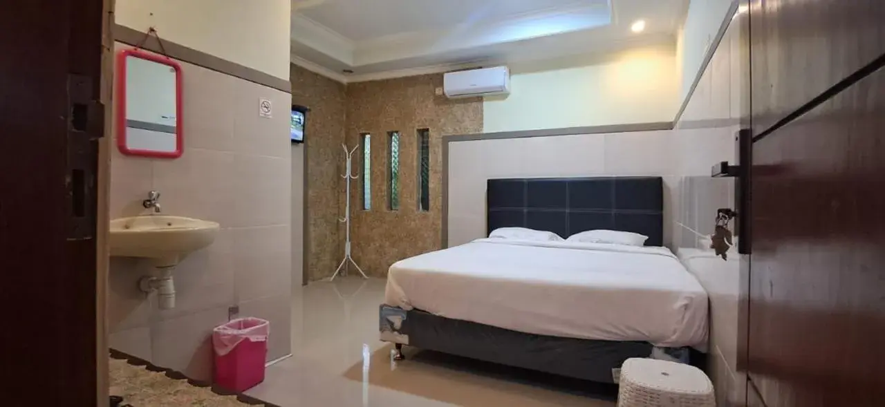 Bed in CALDERA PARK HOMESTAY Syariah Bed in CALDERA PARK HOMESTAY Syariah