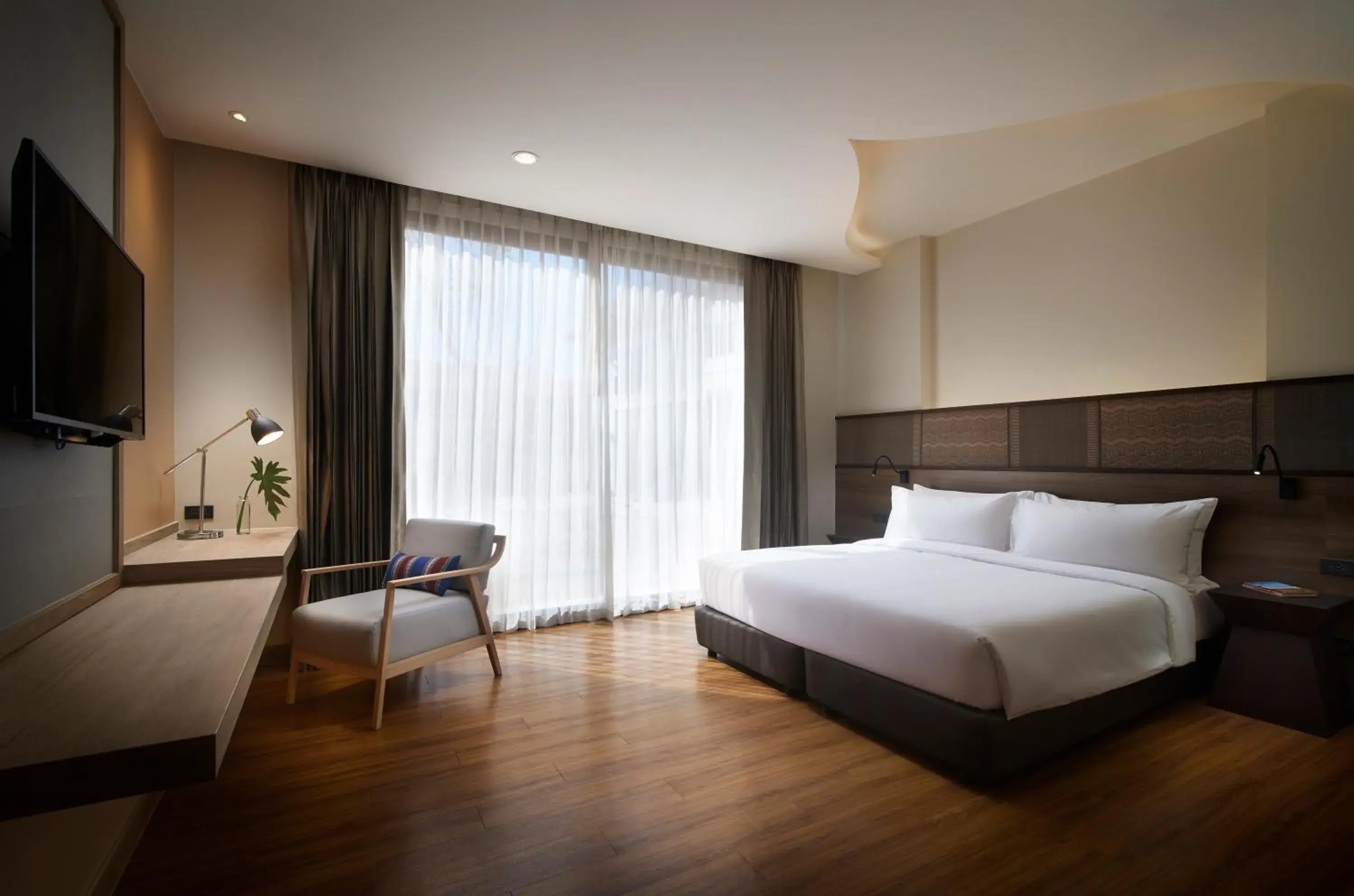 Bed in Emmaline Hotel Nan Bed in Emmaline Hotel Nan