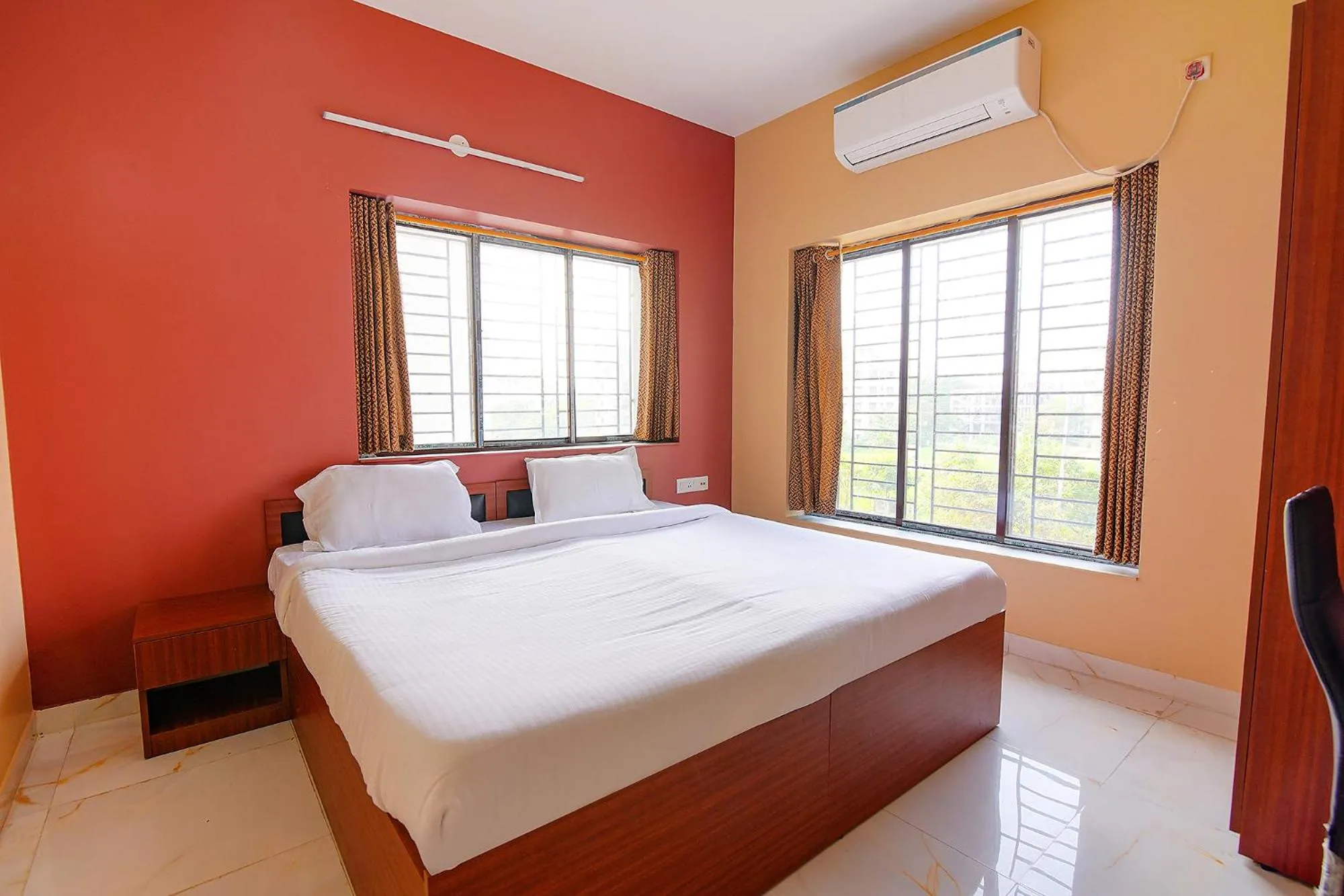 Photo of the whole room, Bed in FabHotel Amar Raj Inn