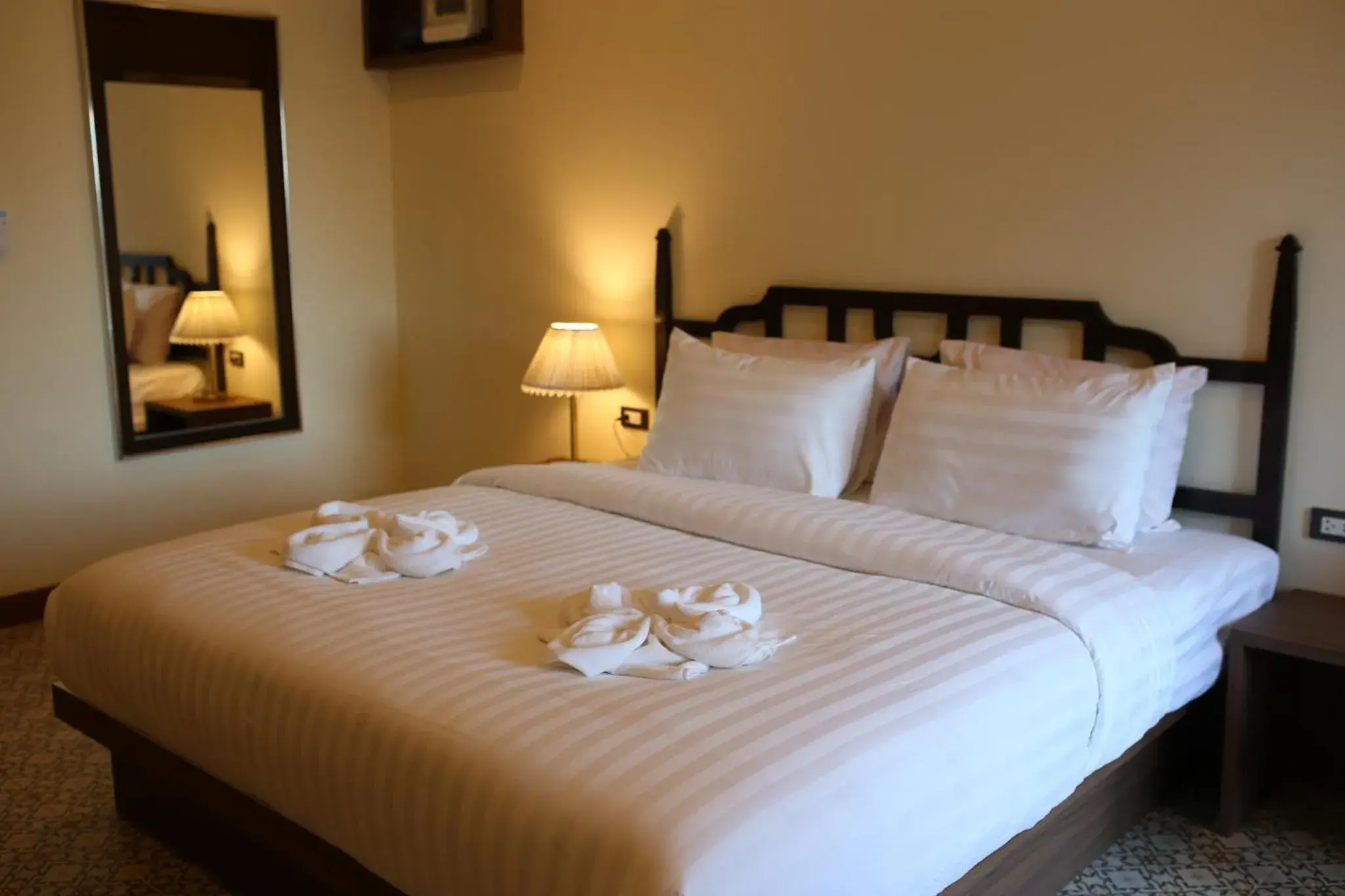 Bed in Baan Chao Khun Hotel Bed in Baan Chao Khun Hotel