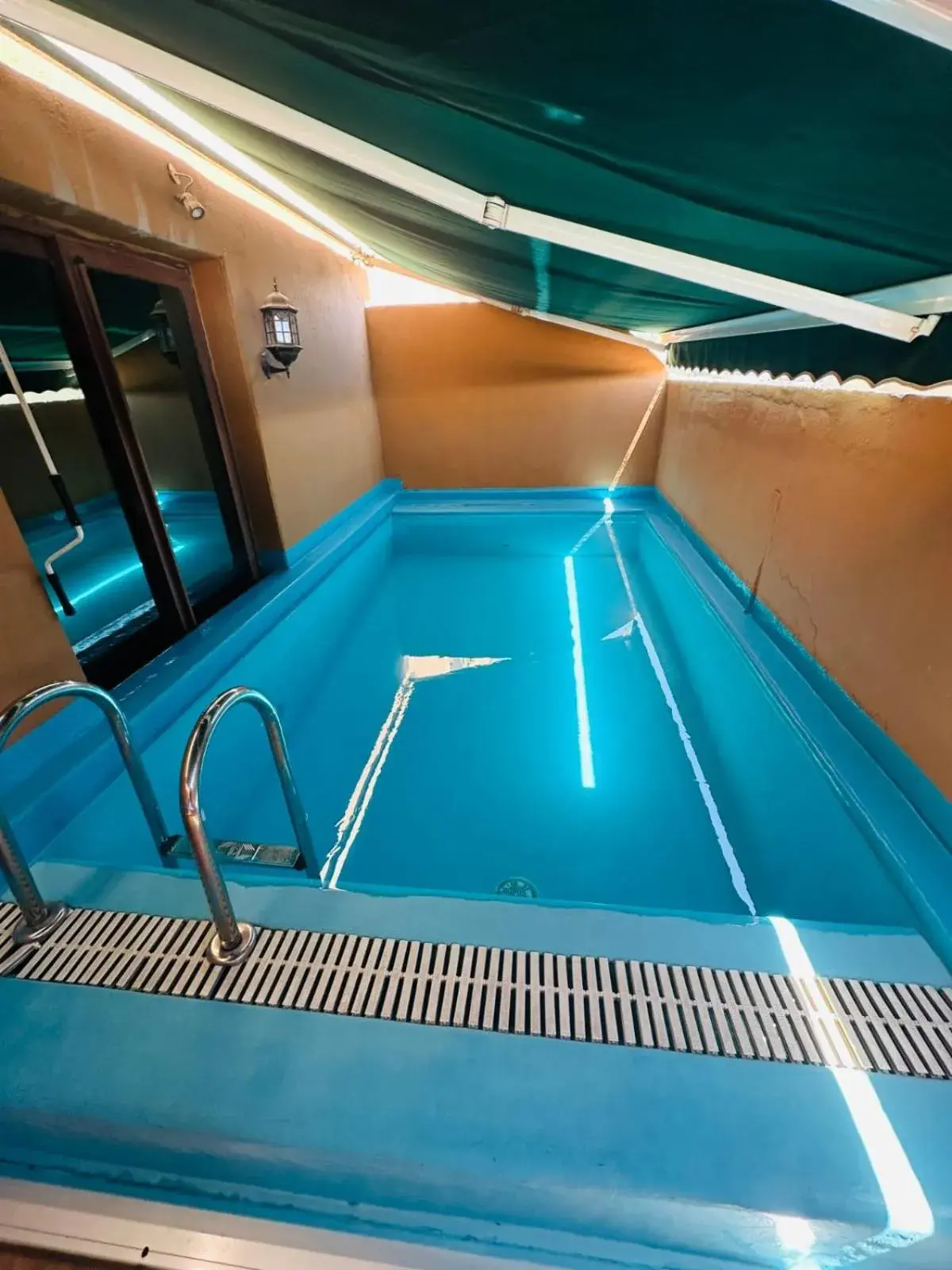 Swimming pool in The Convention Center & Royal Suites Hotel Swimming pool in The Convention Center & Royal Suites Hotel