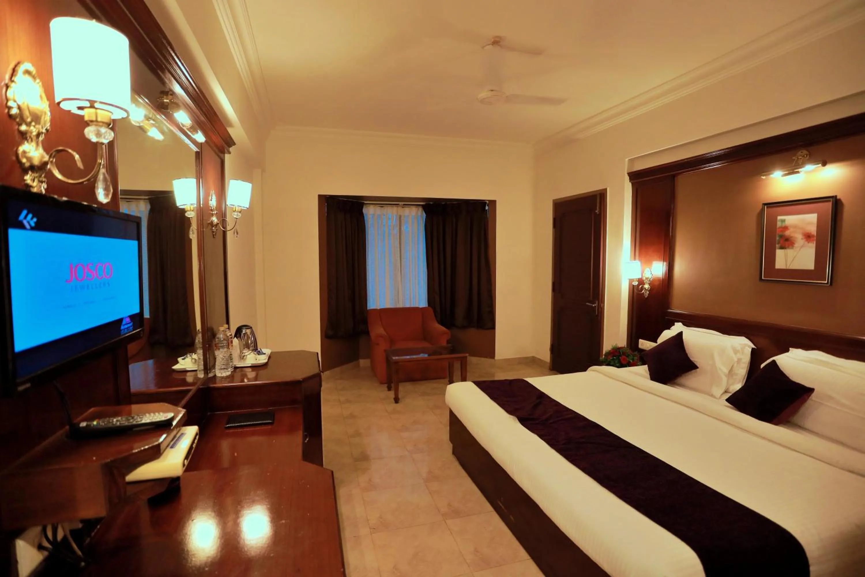 TV and multimedia, Bed in Hotel Edassery Mansion