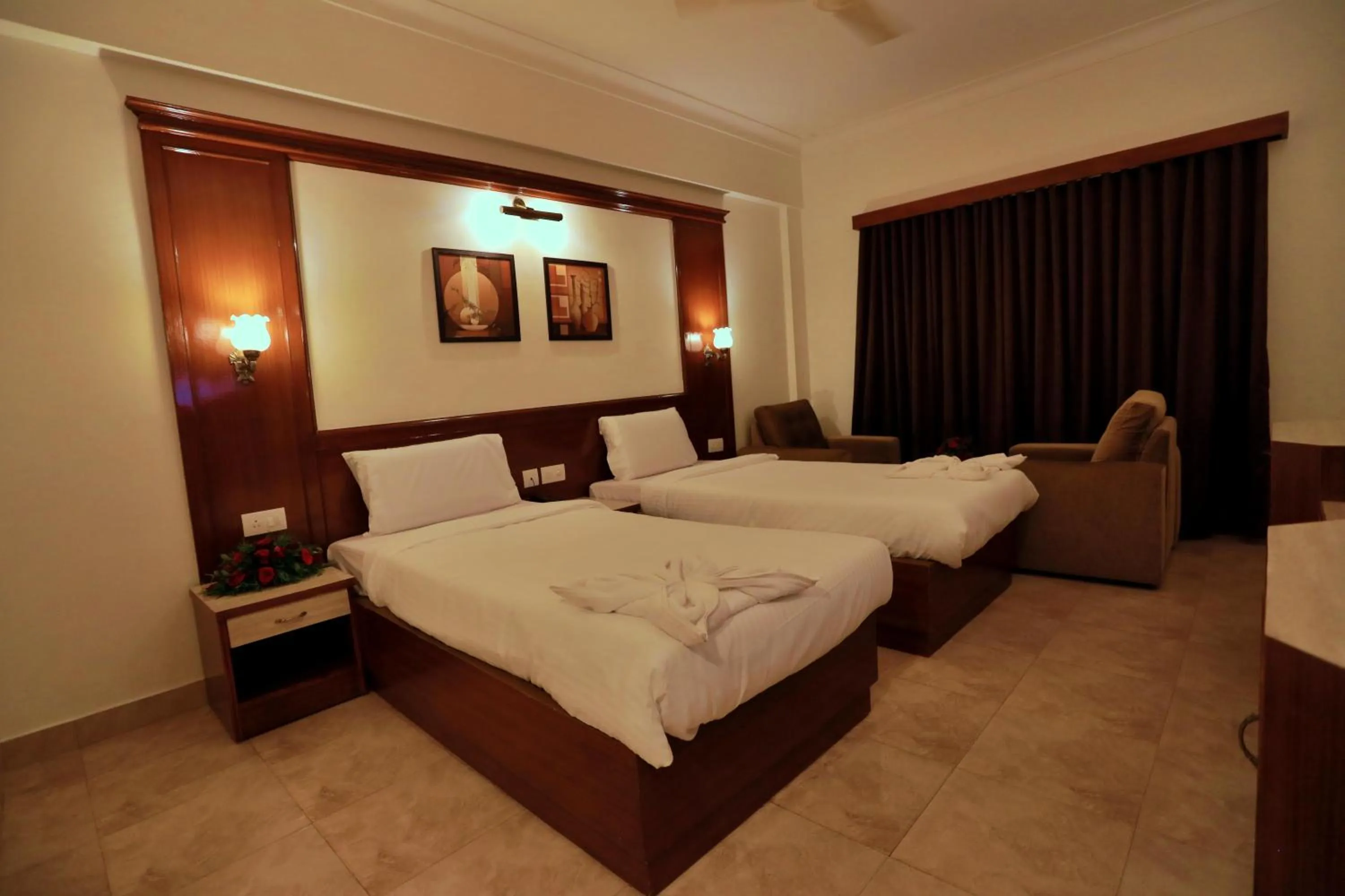 Bed in Hotel Edassery Mansion