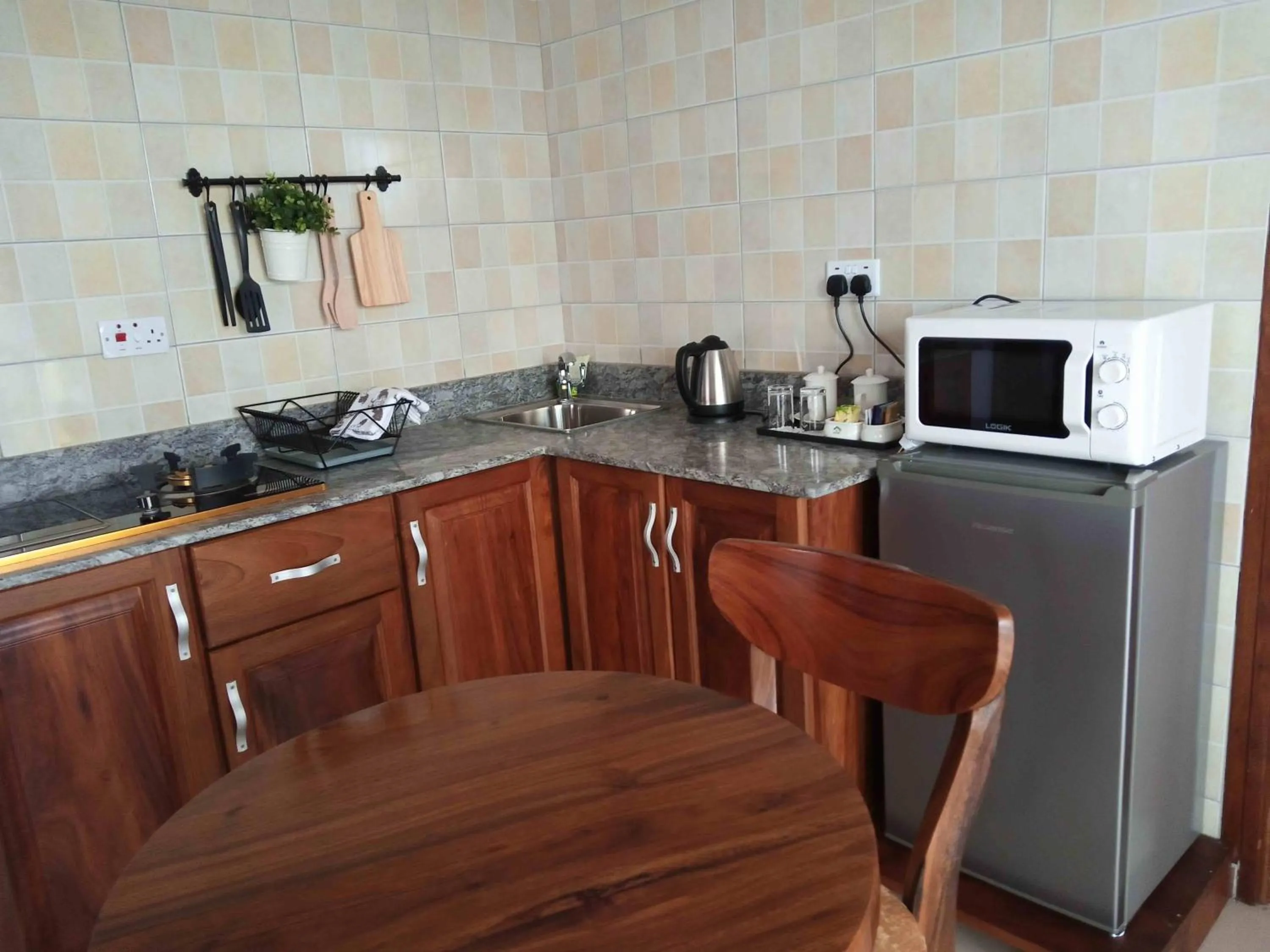 Kitchen or kitchenette in Home Bliss Hotel- Fort portal Uganda