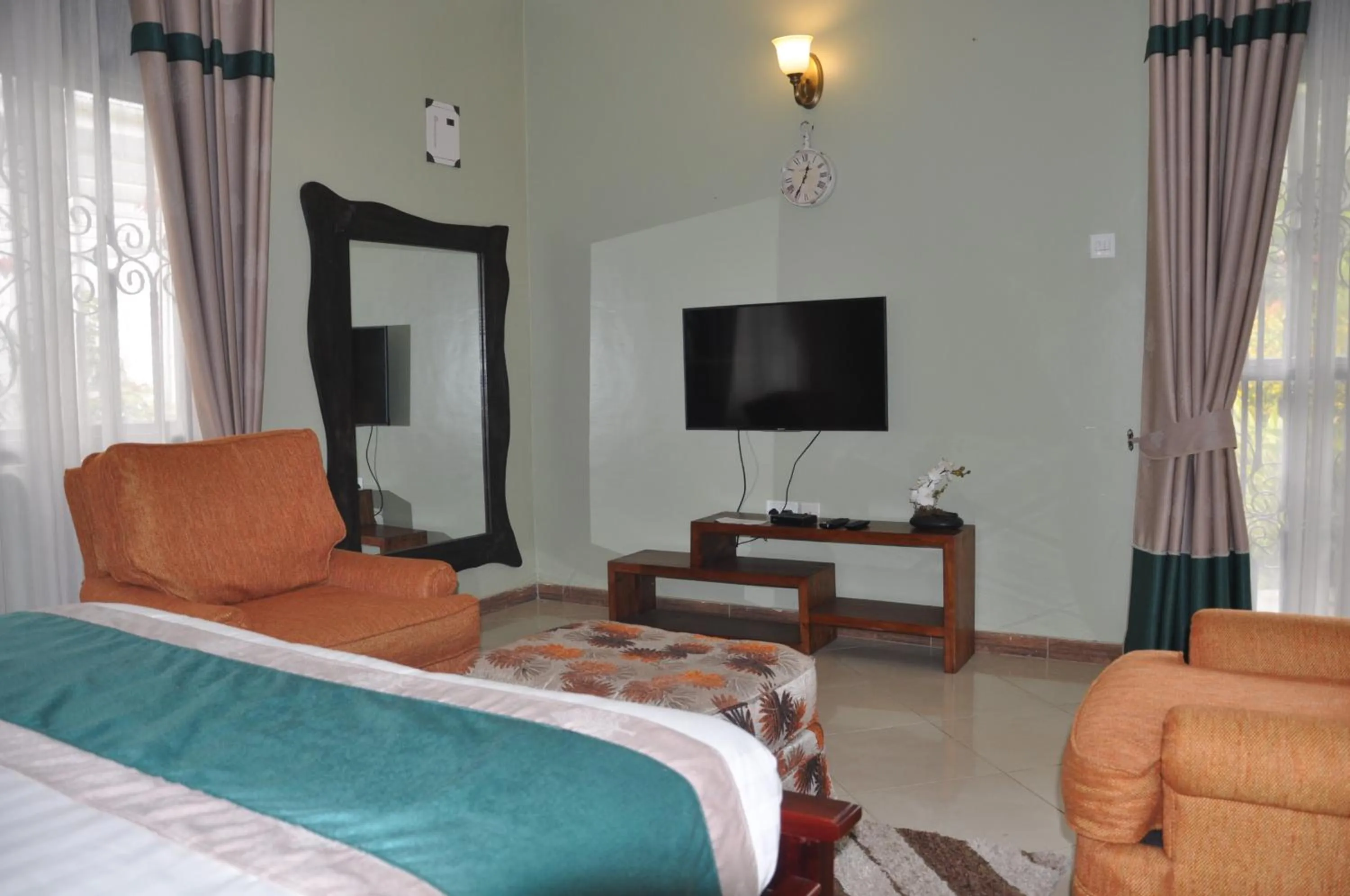 TV and multimedia, Bed in Home Bliss Hotel- Fort portal Uganda