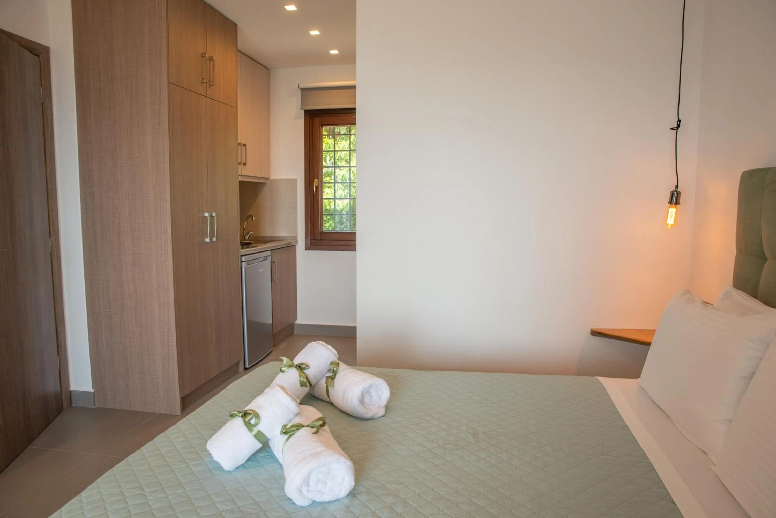 Bed in Aelia Mount Suites