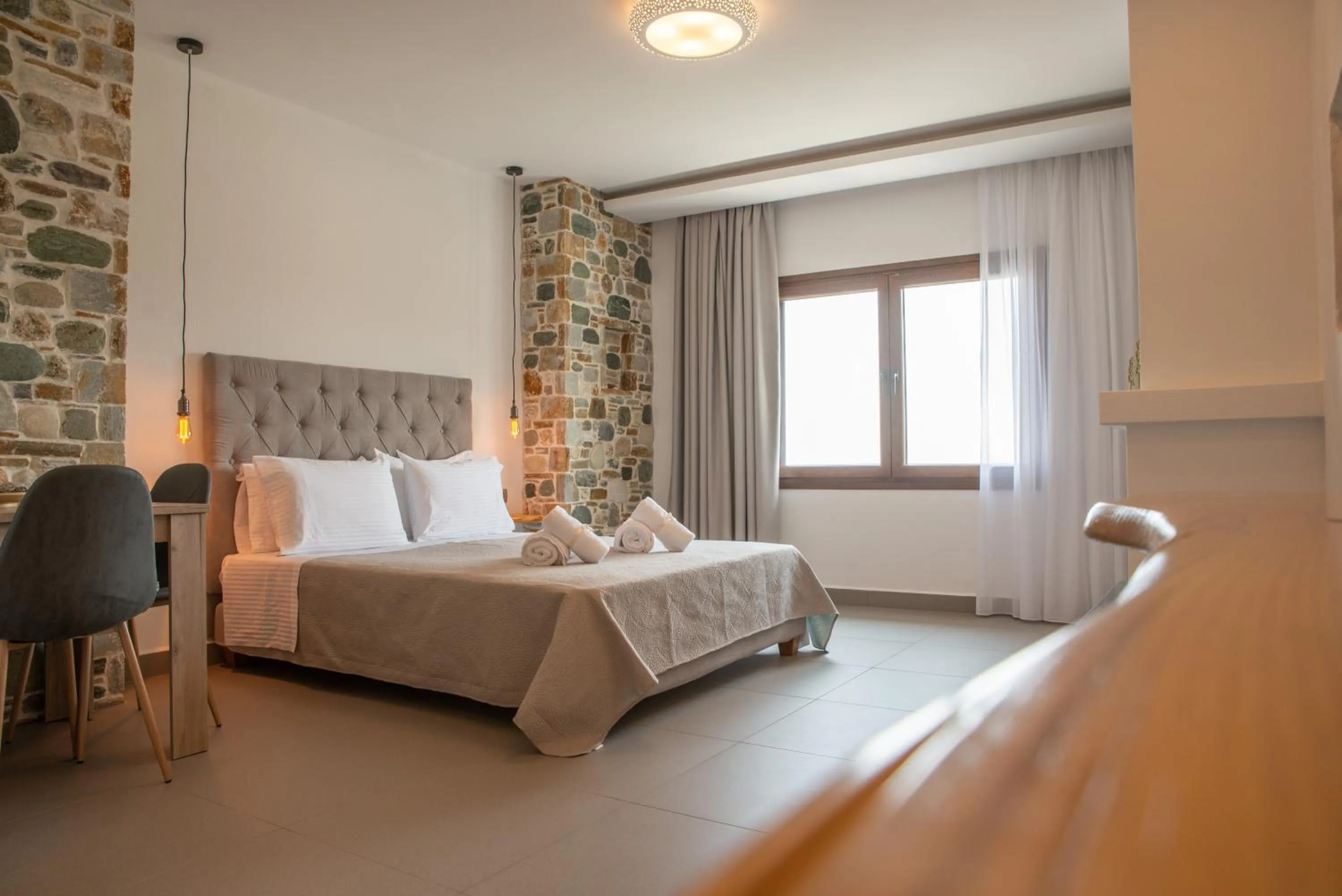 Bed in Aelia Mount Suites