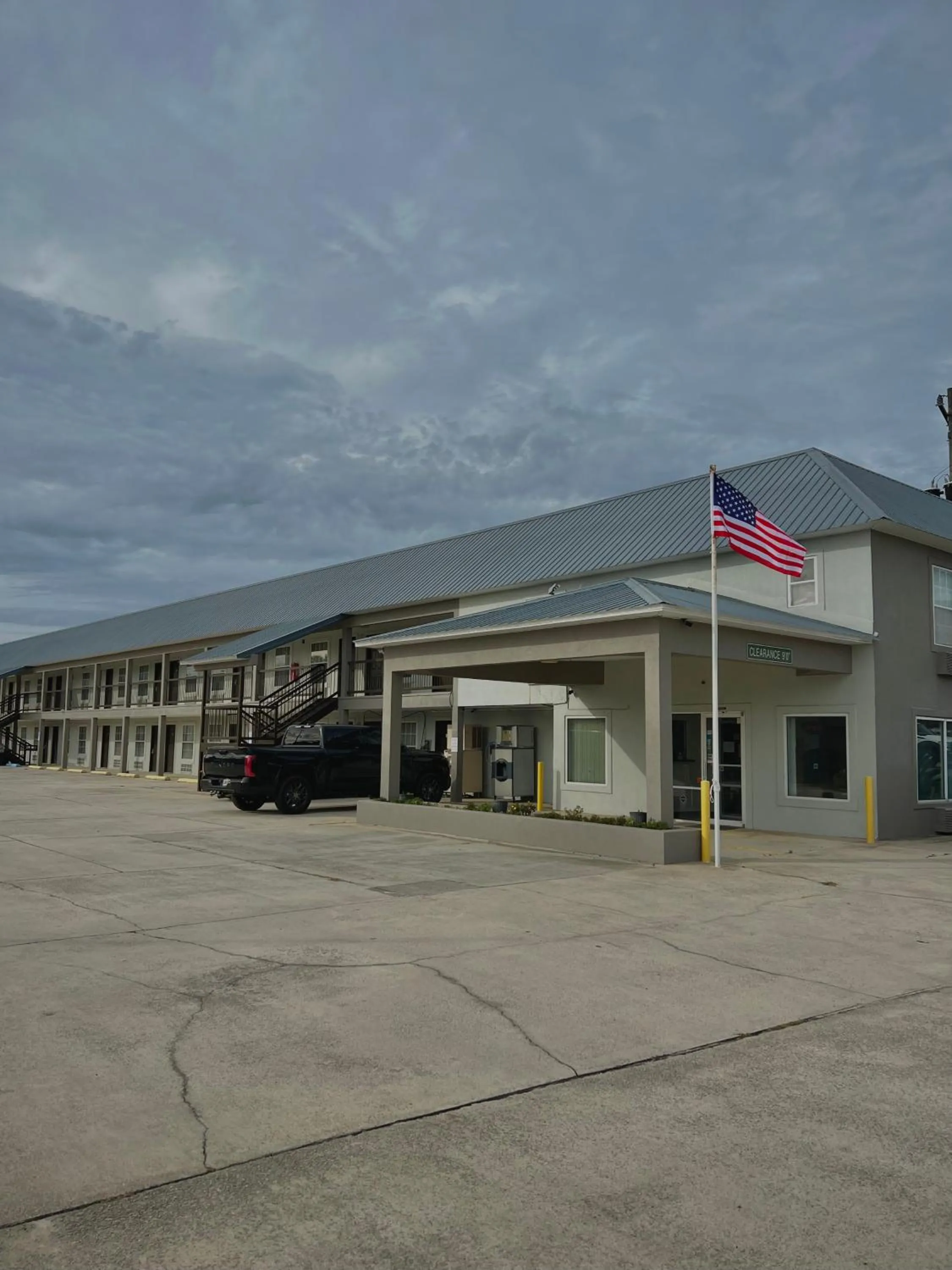 Property building in Garden Inn & Suites