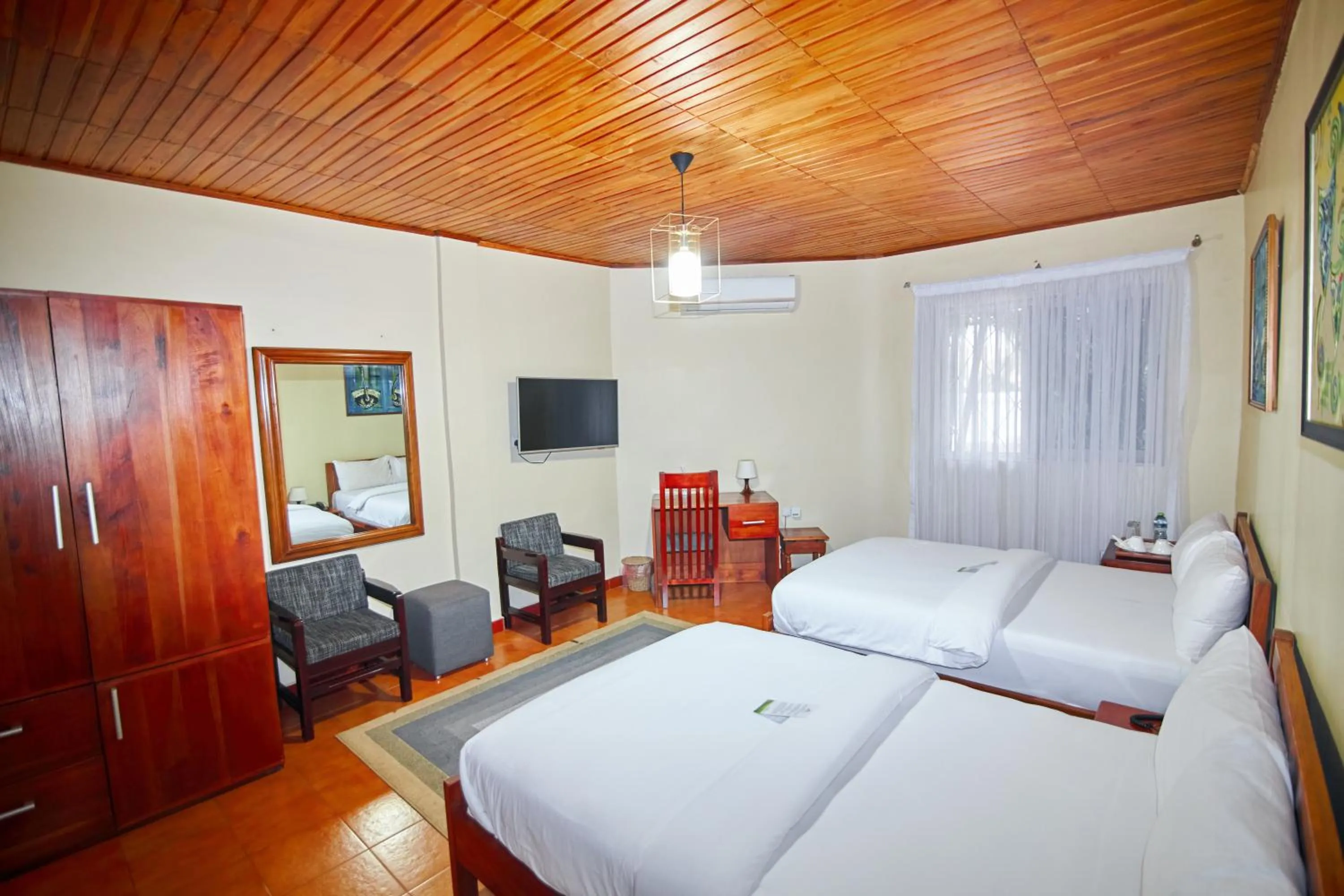 Bed in The Haven Boutique Hotel