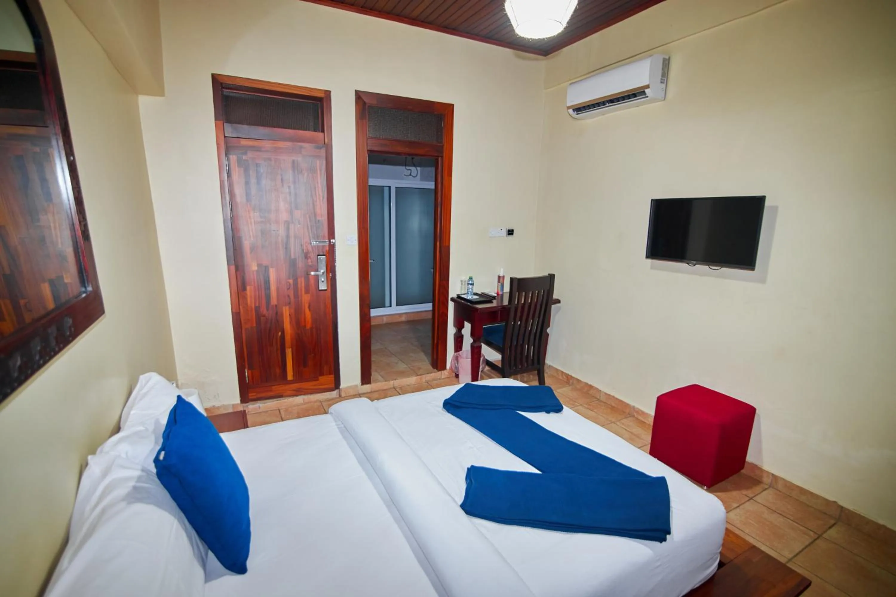 Bed in The Haven Boutique Hotel