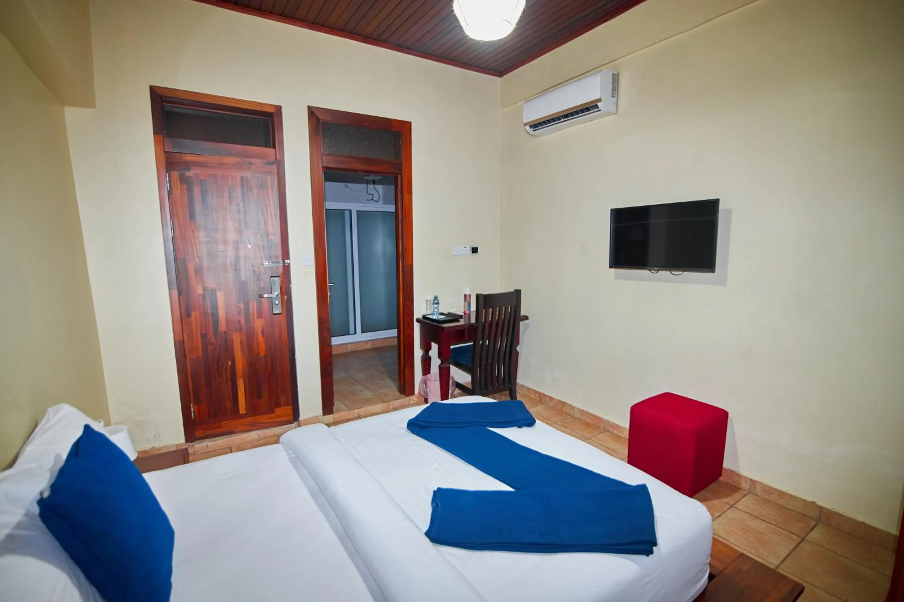 Bed in The Haven Boutique Hotel