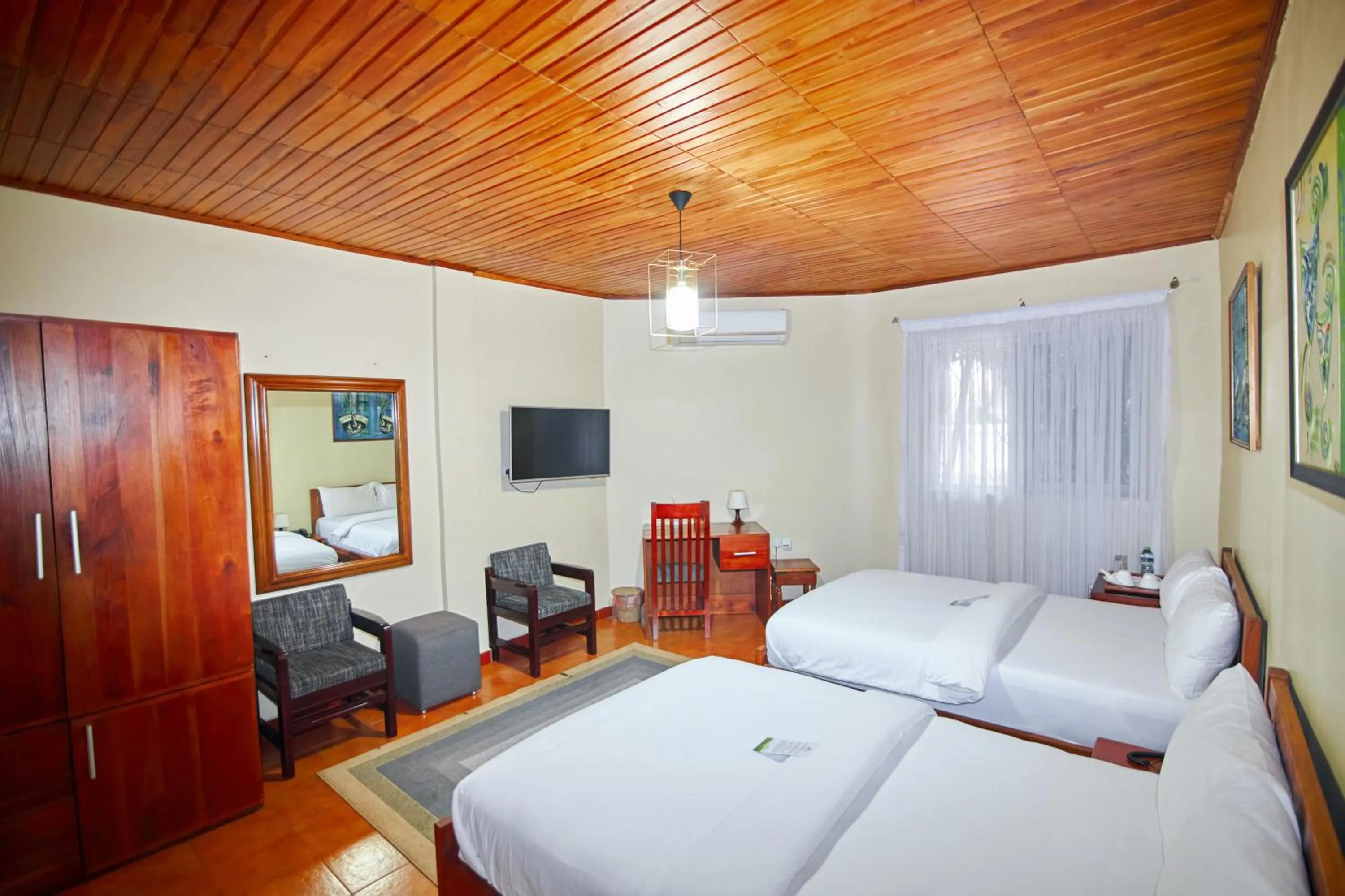 Bed in The Haven Boutique Hotel