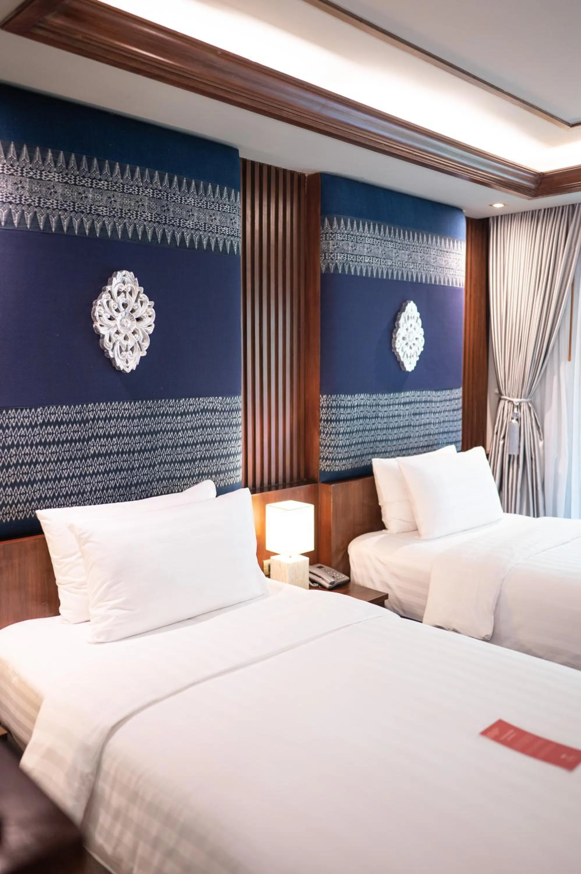 Bed in At Gate Thaphae Hotel