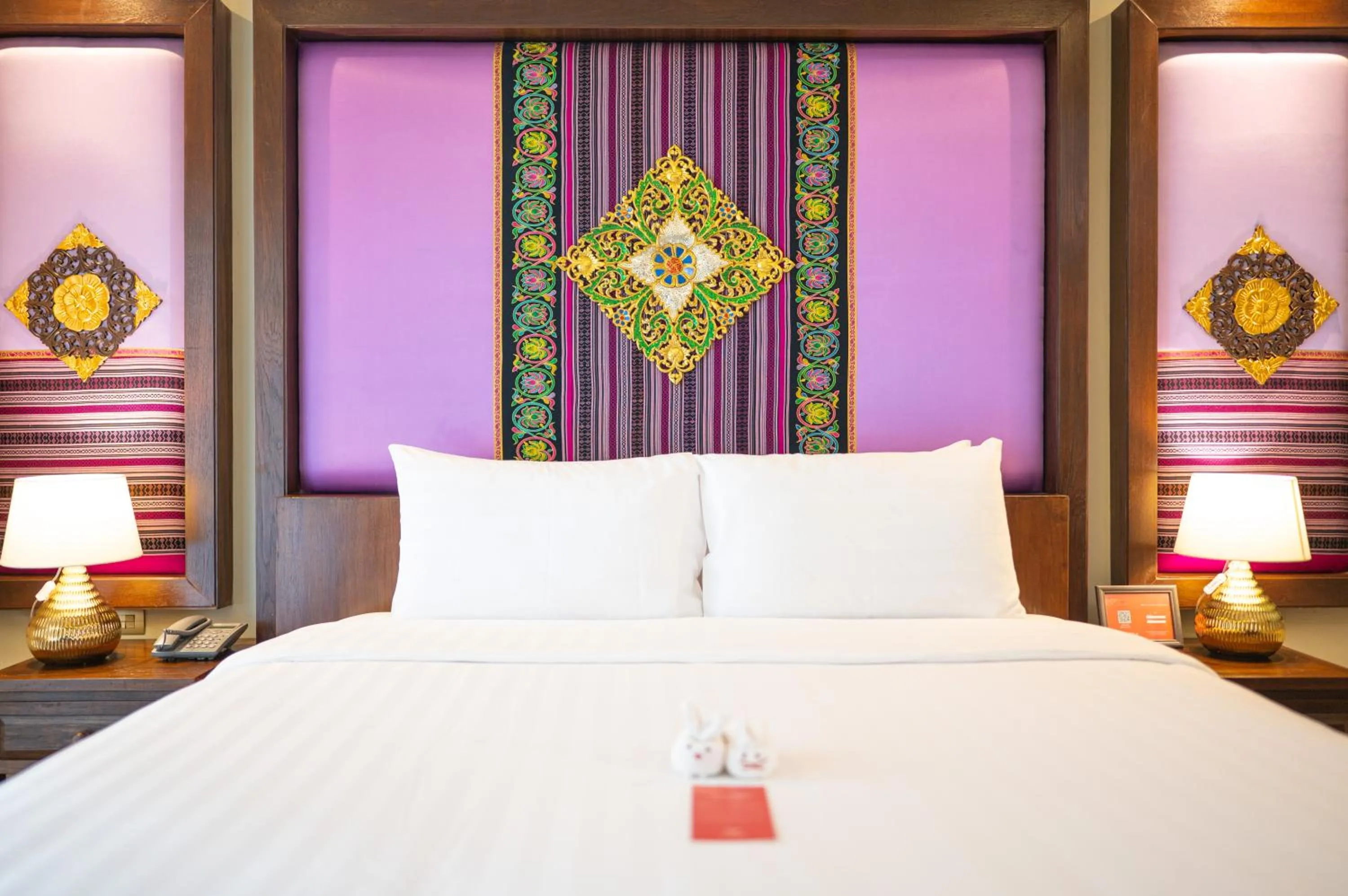 Bed in At Gate Thaphae Hotel