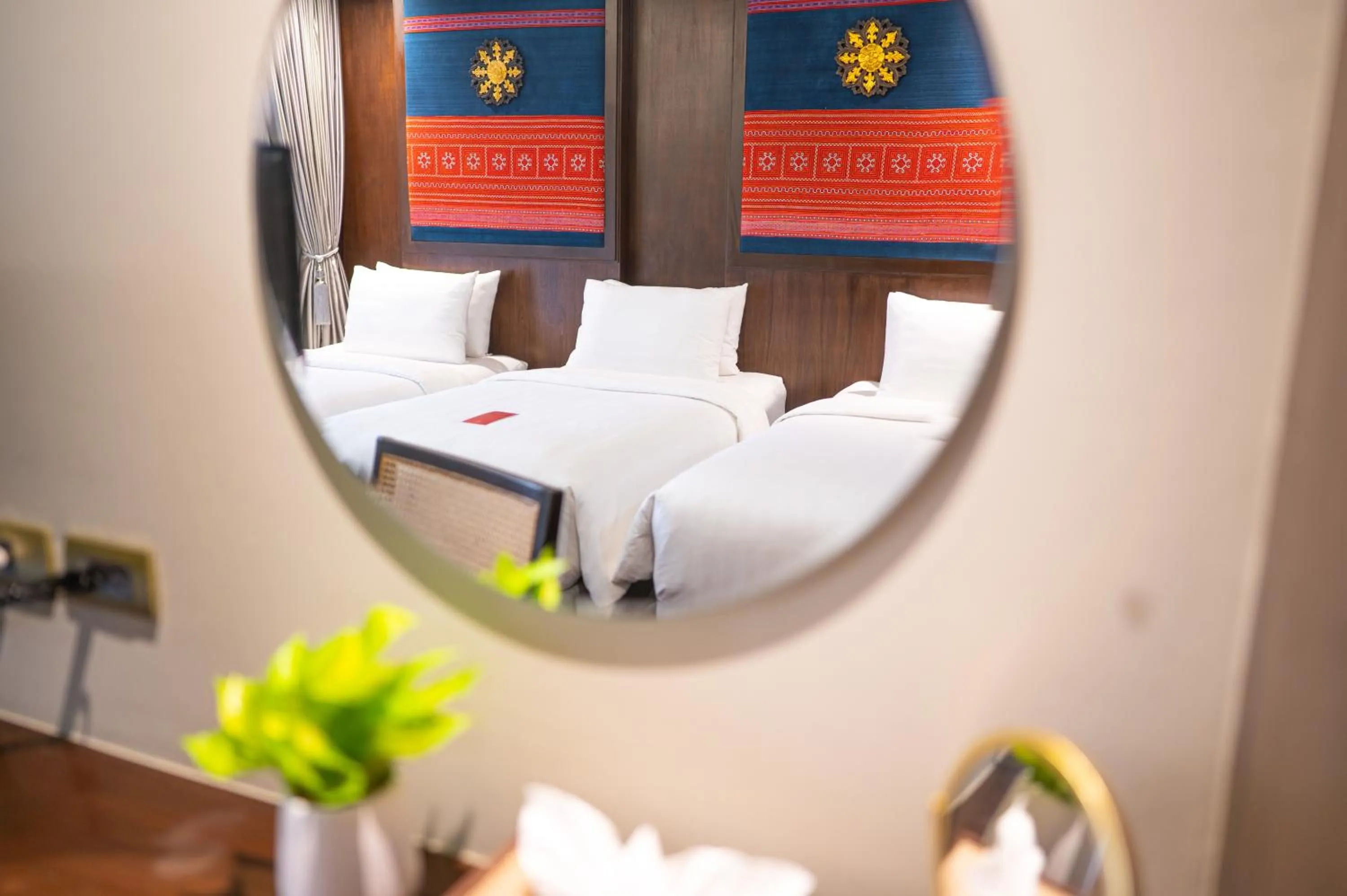 Bed in At Gate Thaphae Hotel