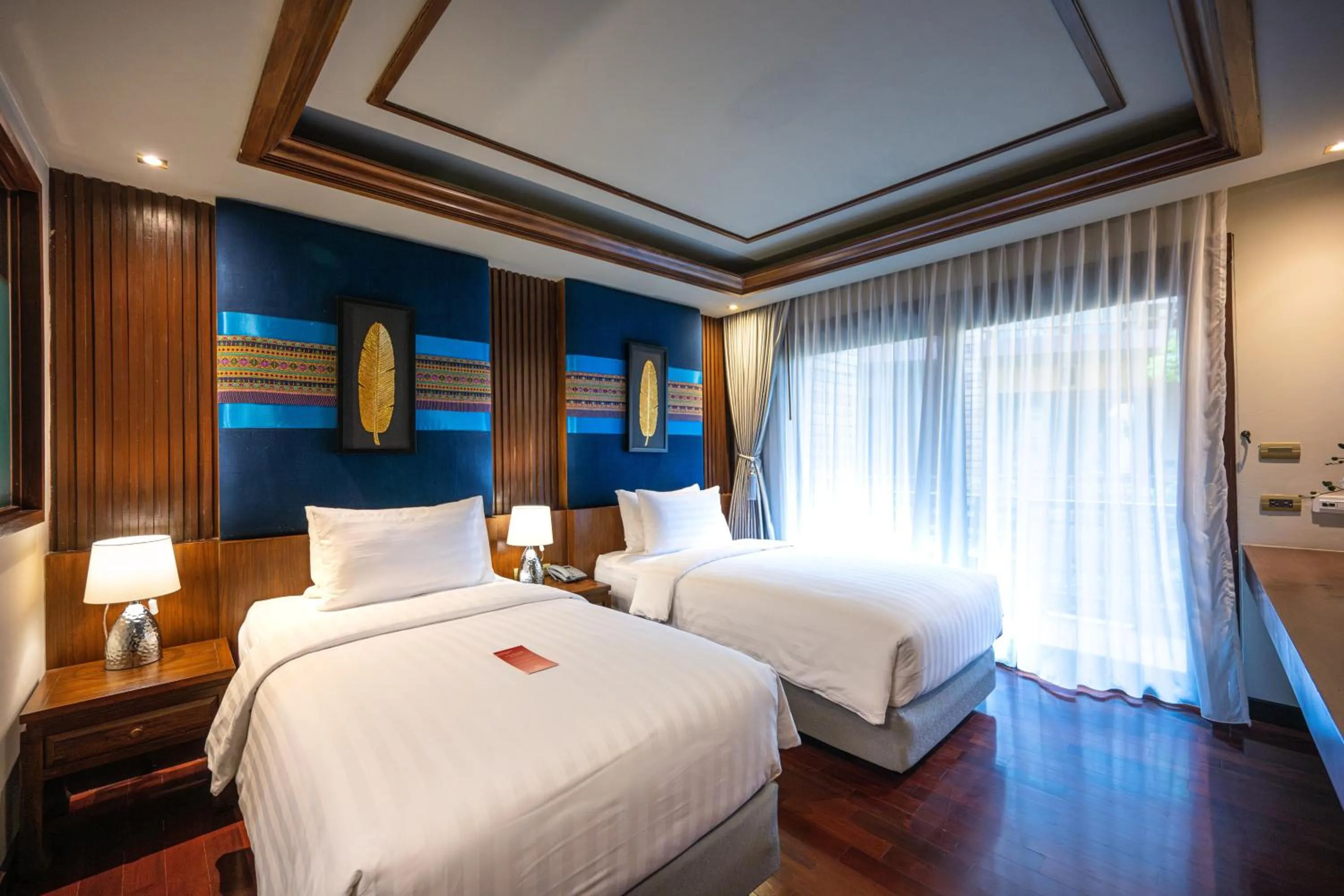 Bed in At Gate Thaphae Hotel