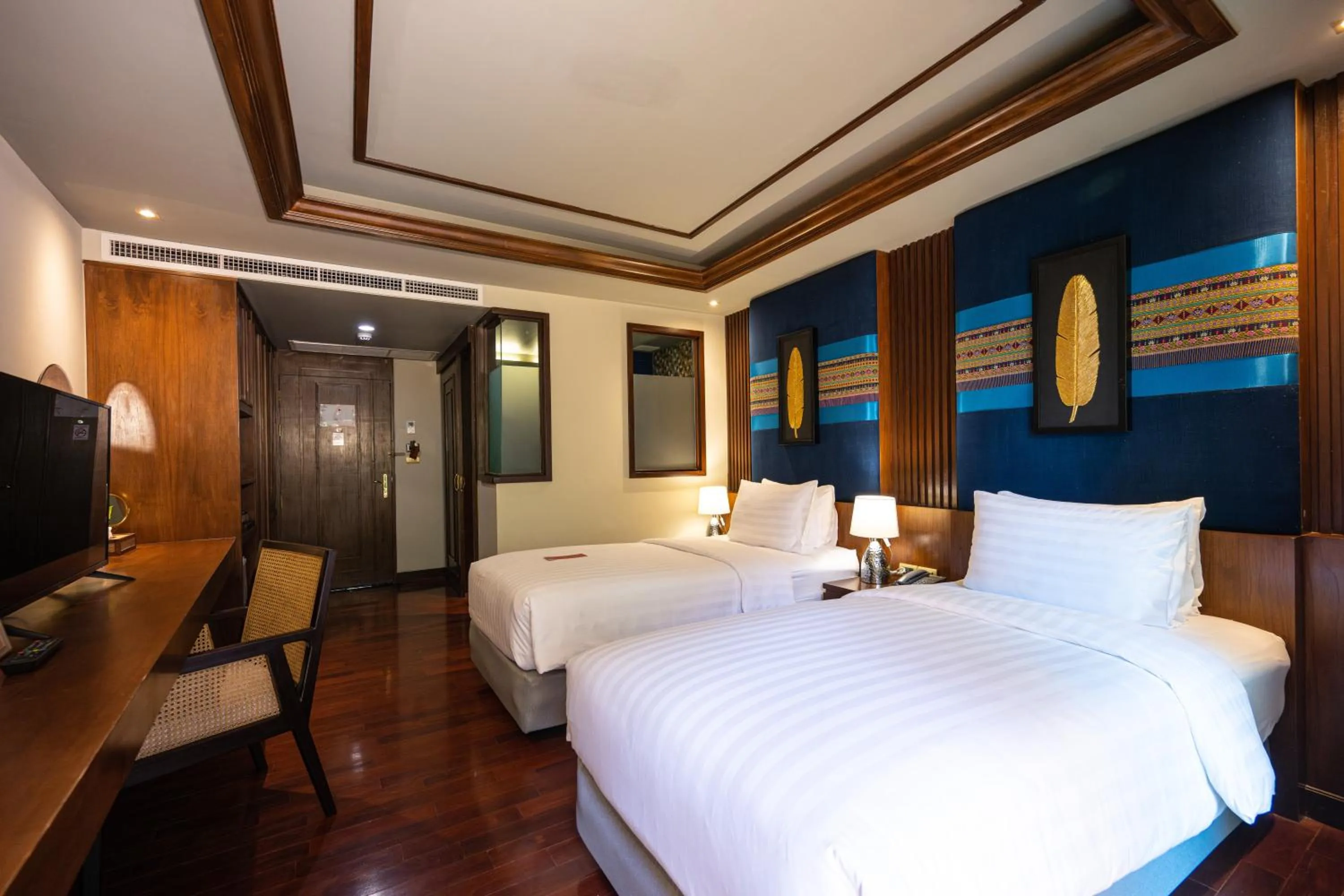 Bed in At Gate Thaphae Hotel