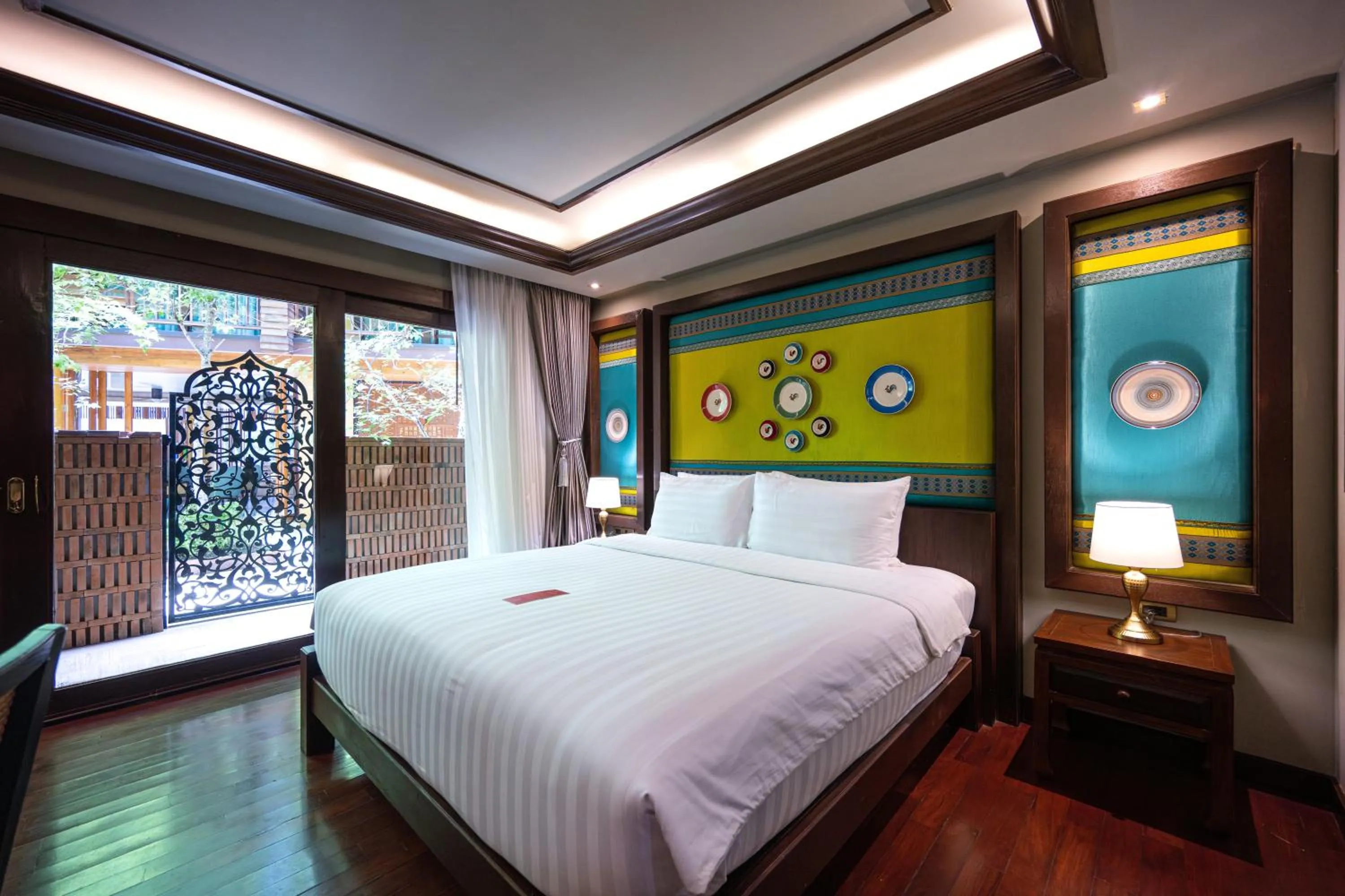 Bed in At Gate Thaphae Hotel