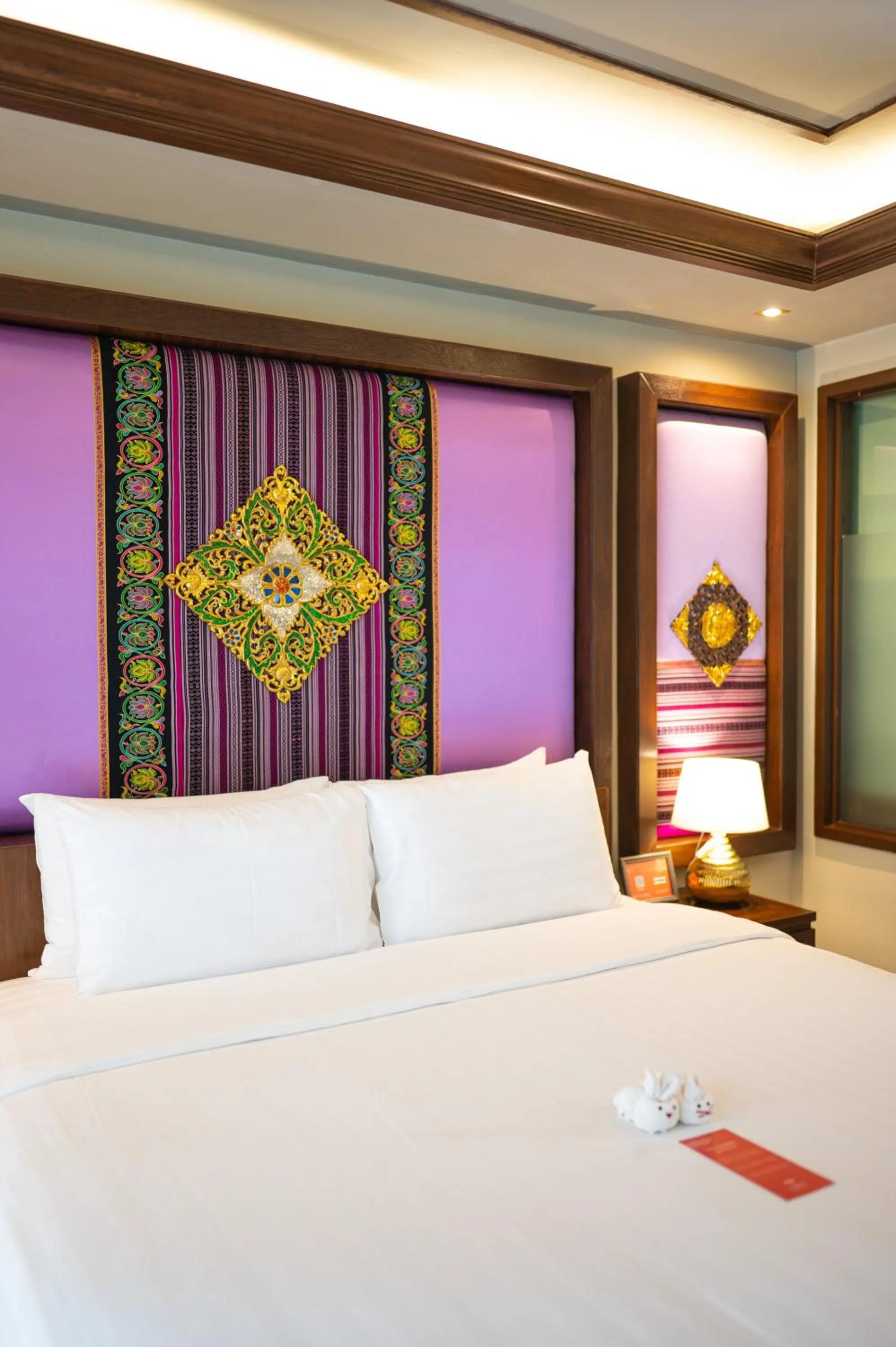 Bed in At Gate Thaphae Hotel