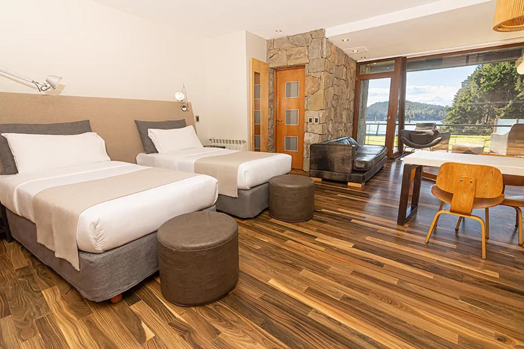 Bed in Rochester Bariloche Suites & Spa