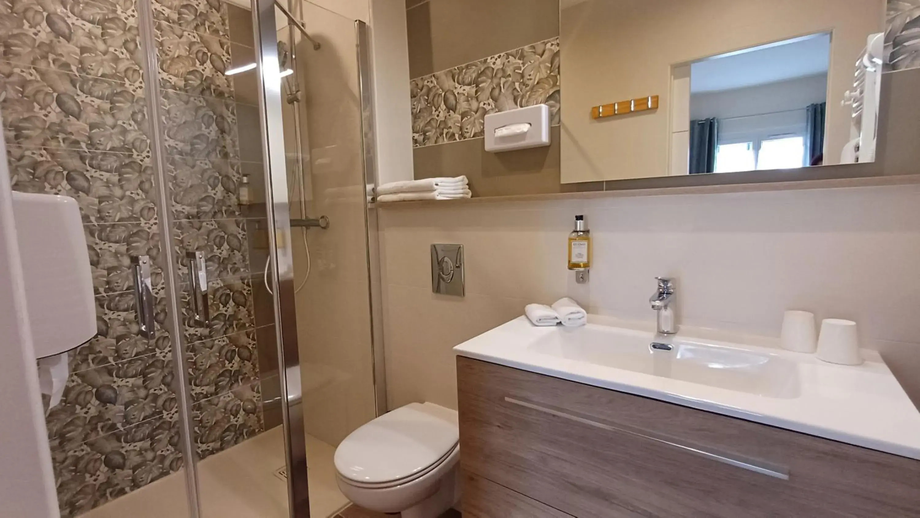 Bathroom in Logis Hotel Le Cerf Bathroom in Logis Hotel Le Cerf