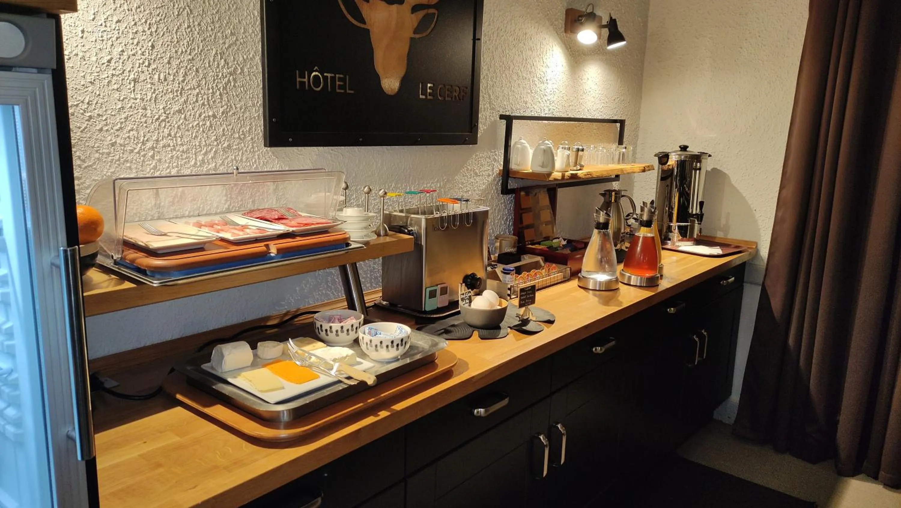 Buffet breakfast in Logis Hotel Le Cerf