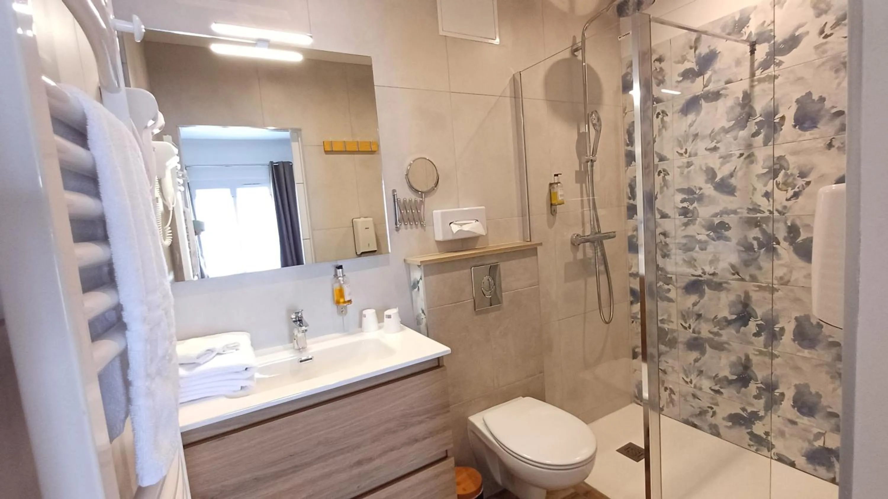 Inner courtyard view in Logis Hotel Le Cerf