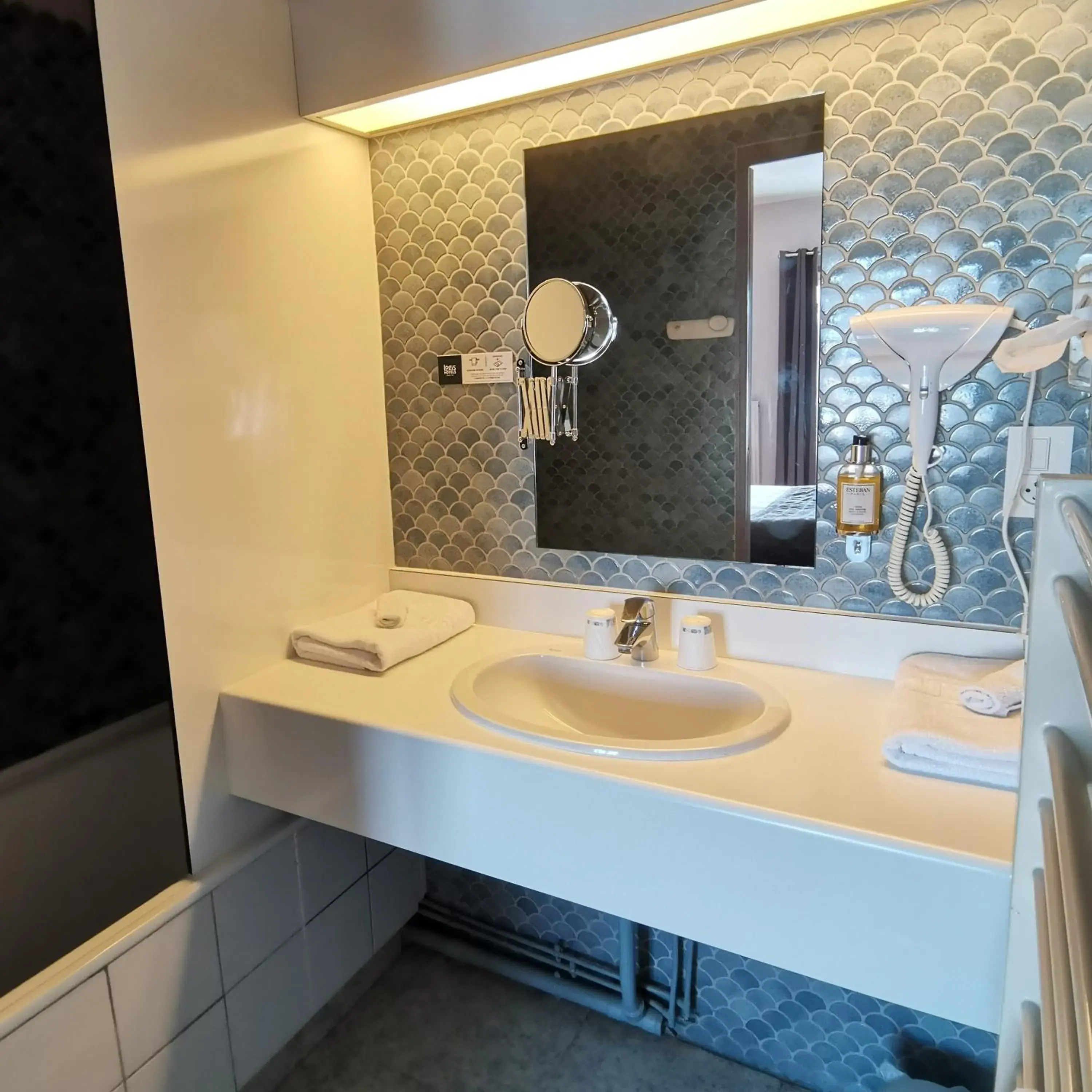 Inner courtyard view in Logis Hotel Le Cerf Inner courtyard view in Logis Hotel Le Cerf