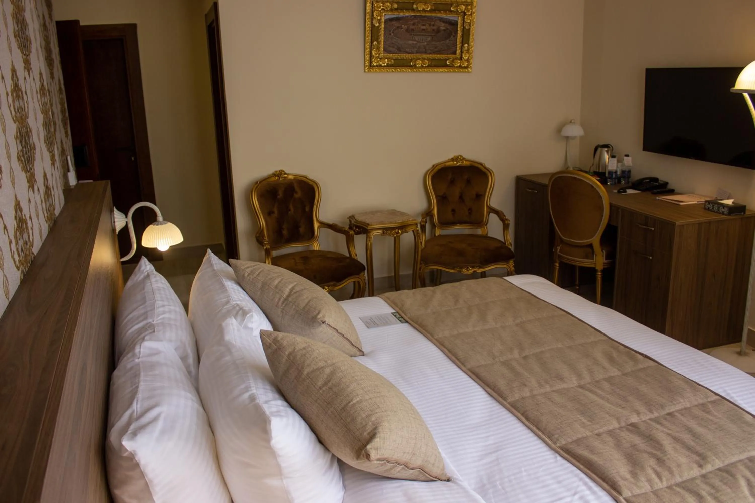 Seating area, Bed in Khan Khediwe Hotel