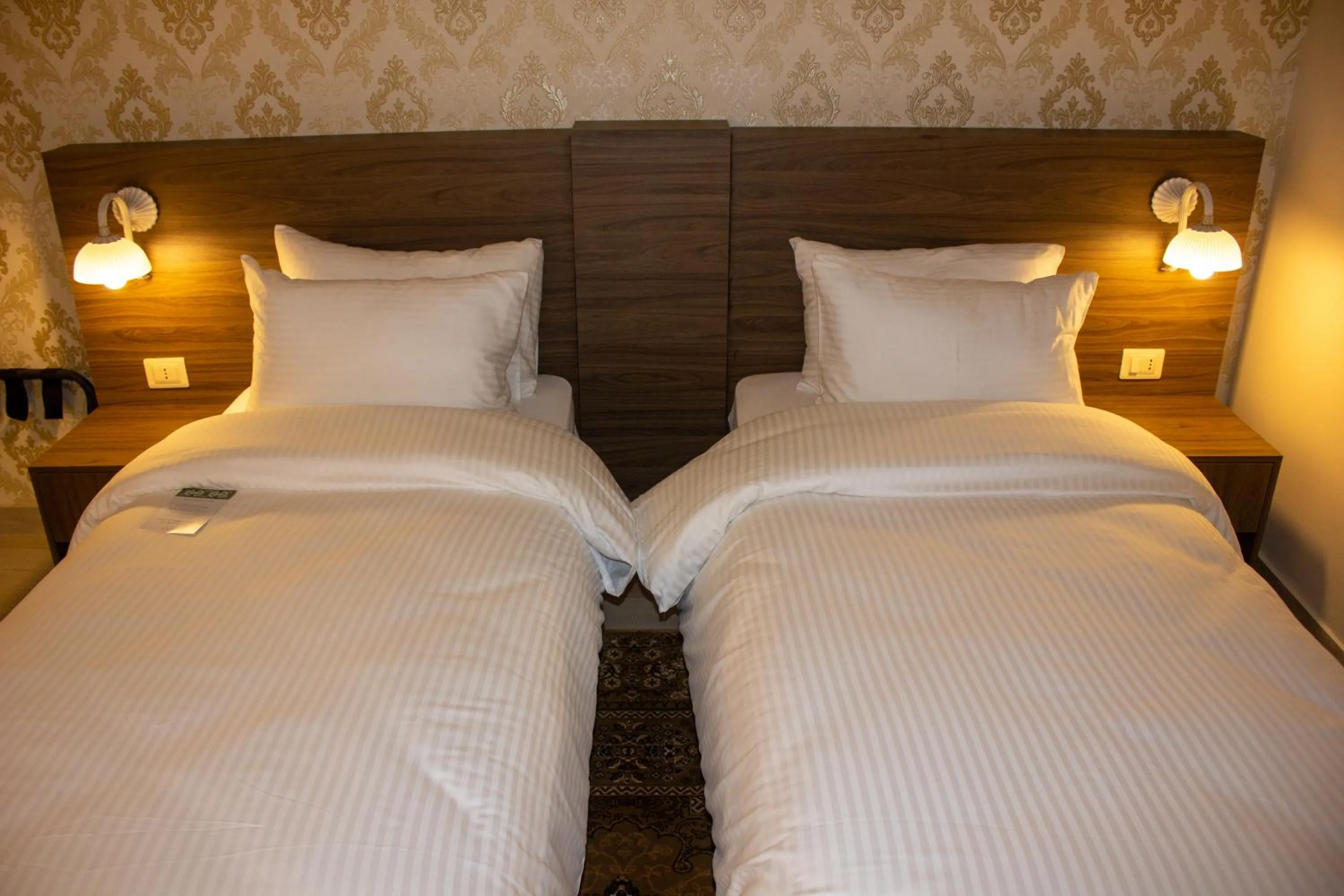 Bed in Khan Khediwe Hotel