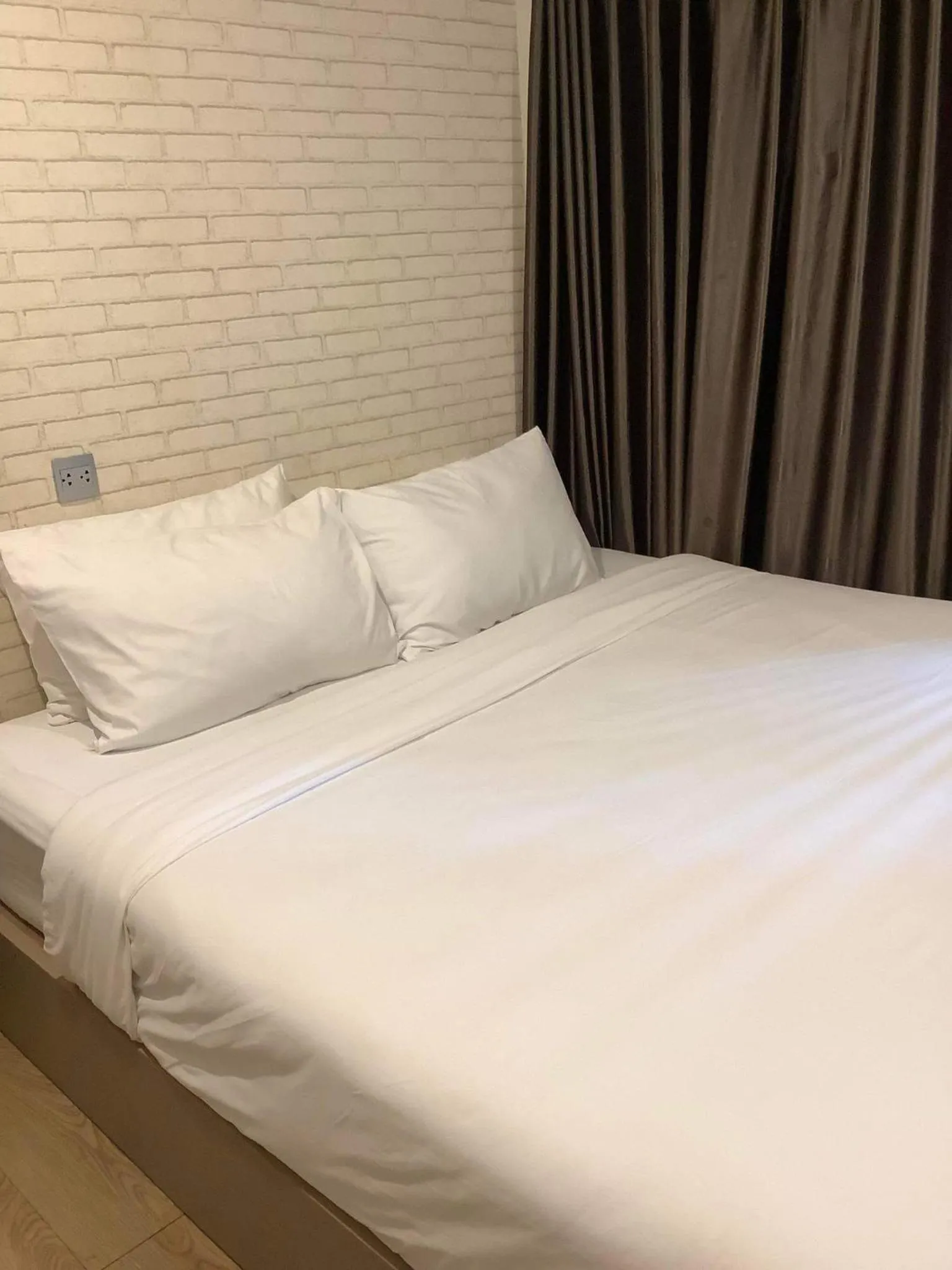 Bed in CR.HOTEL