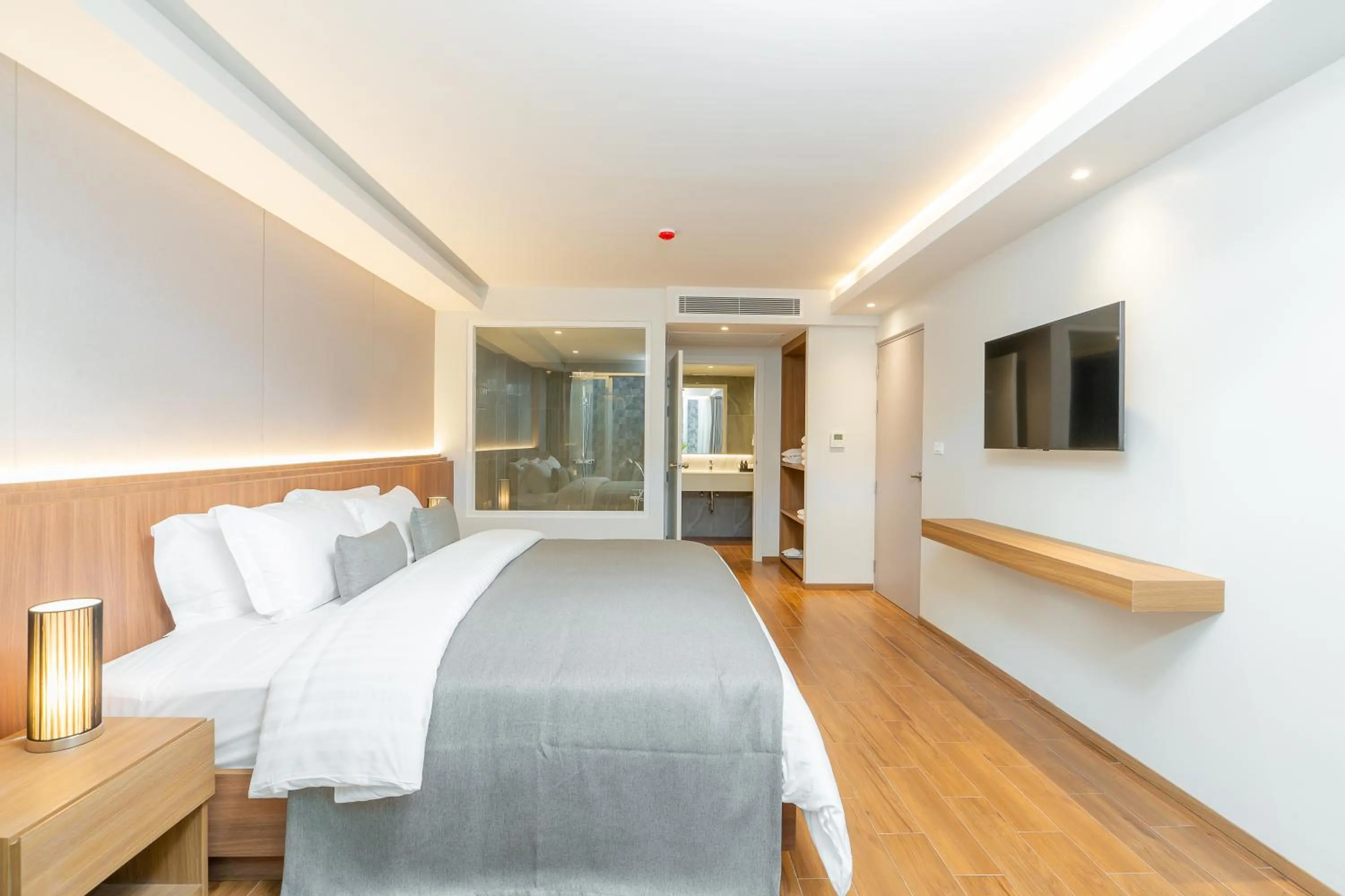 Photo of the whole room, Bed in Shambhala Hotel Pattaya