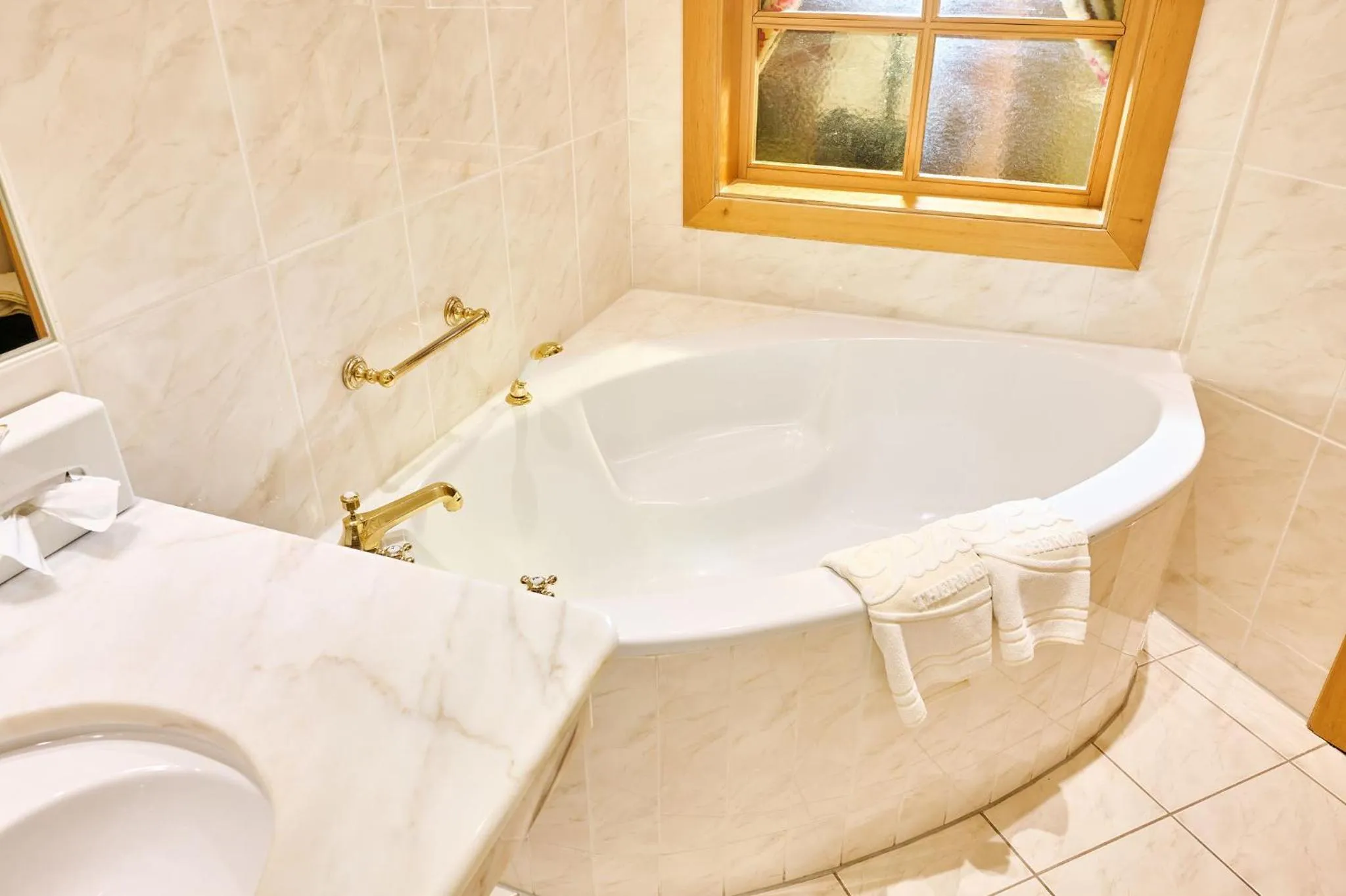 Bathroom in Thermenwelt Hotel Pulverer