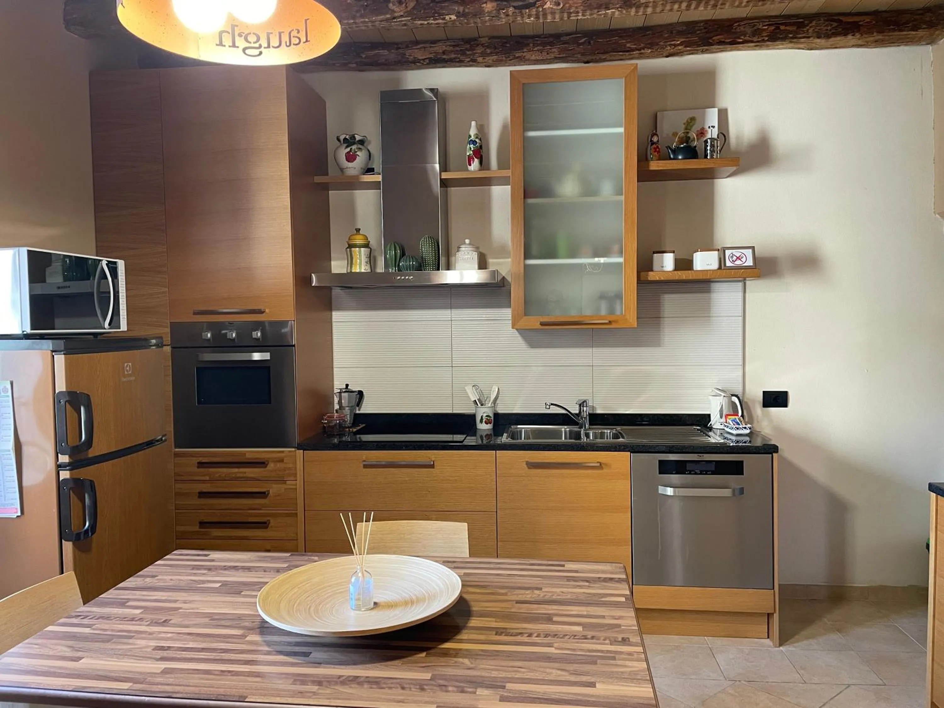 Kitchen or kitchenette in La Casa Sul Sasso In town serviced accommodations