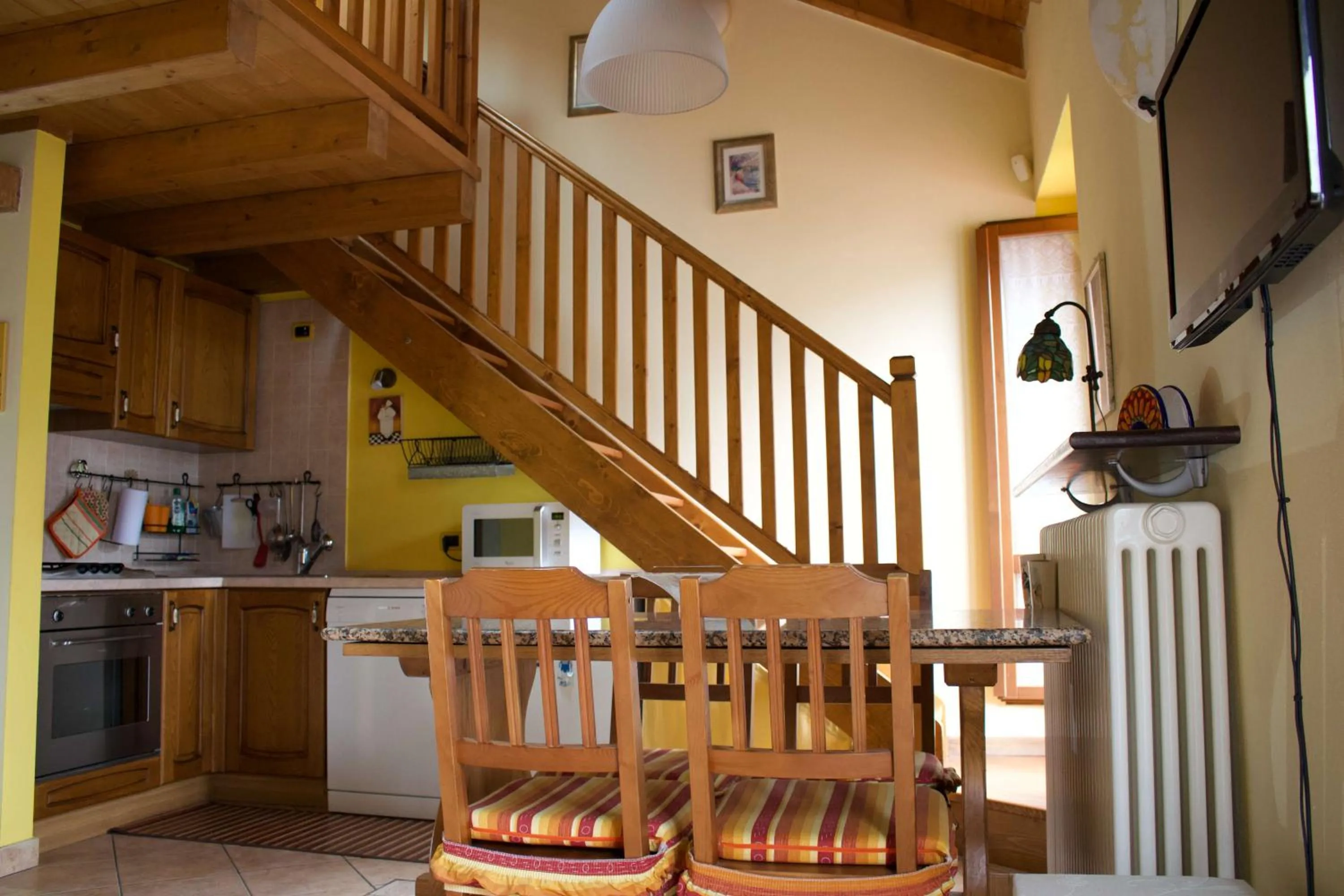 Kitchen or kitchenette in La Casa Sul Sasso In town serviced accommodations