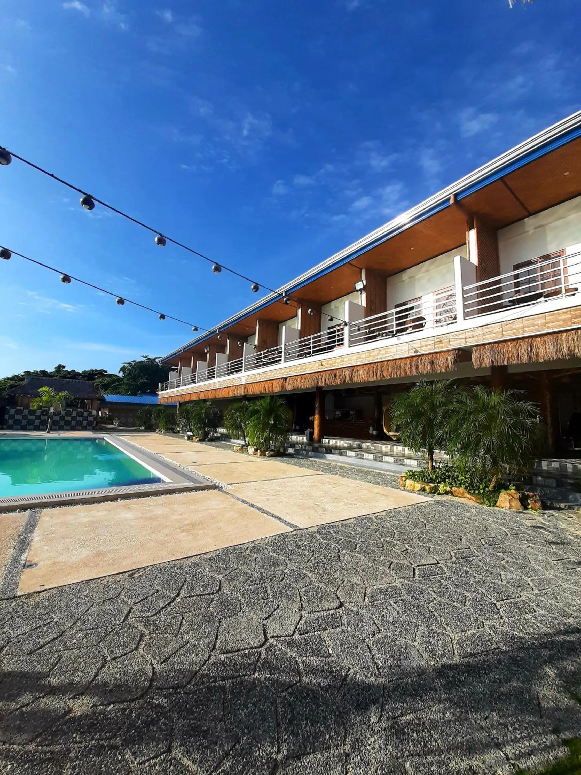 Property building in LaSersita Casitas and Water Spa Beach Resort by Cocotel