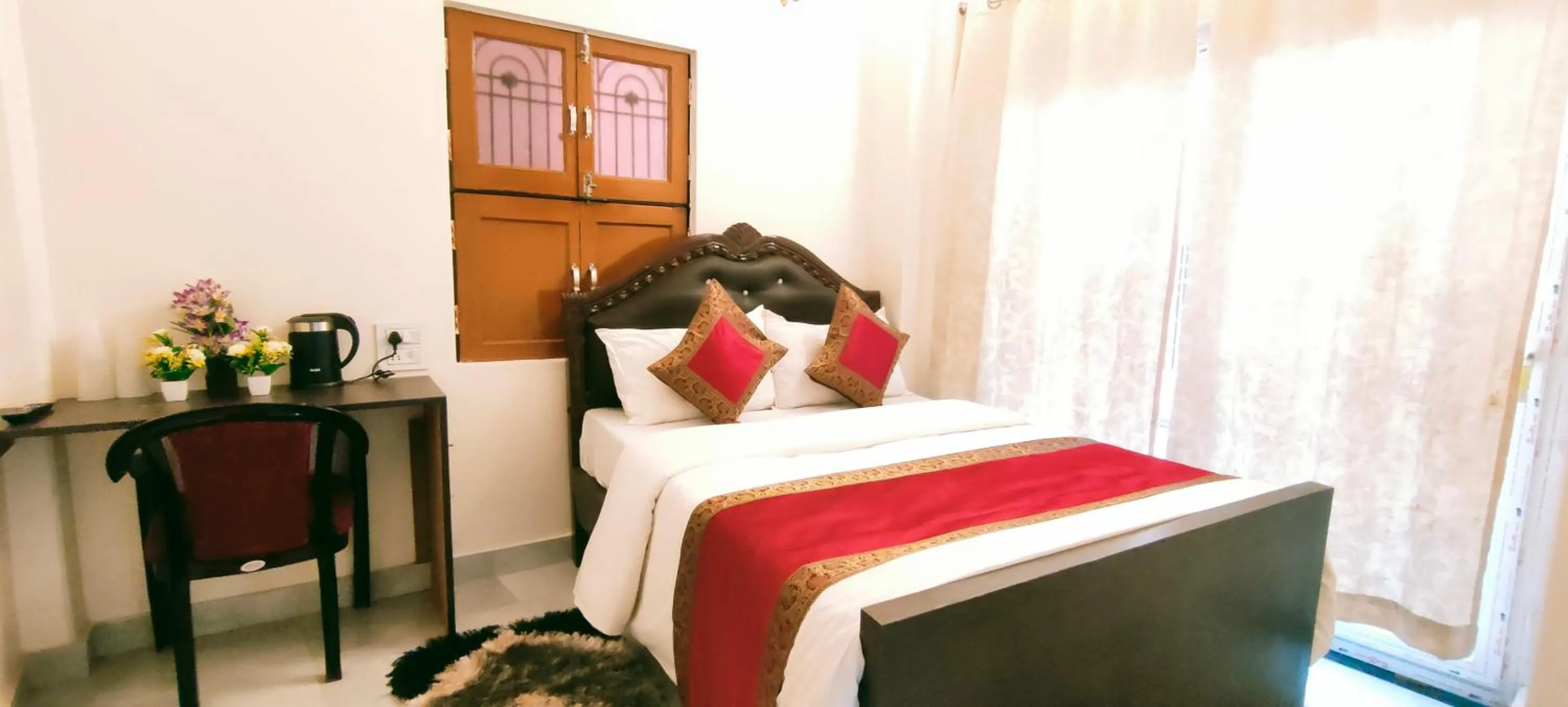 Bed in Hotel Shannti Inn