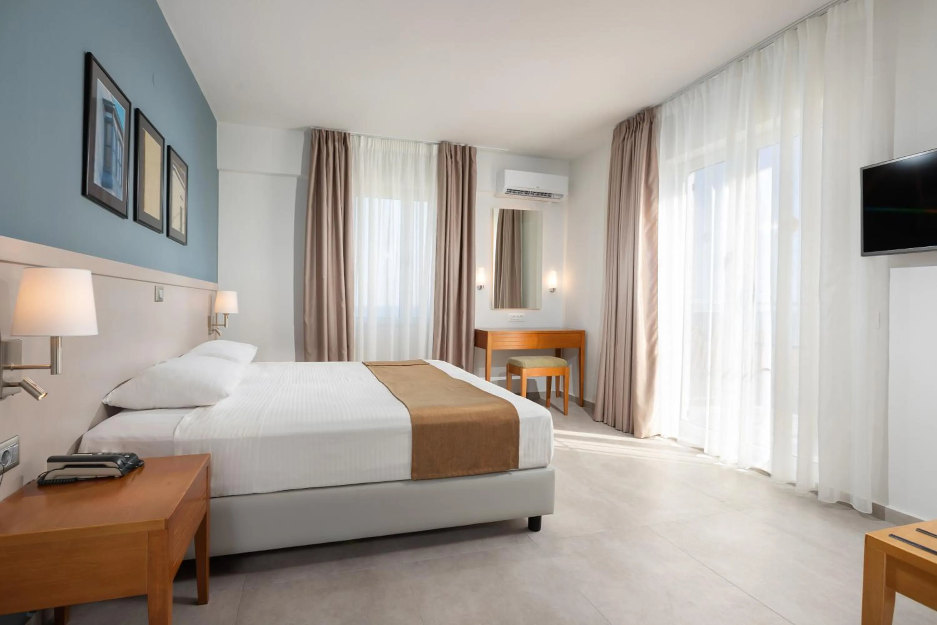 Bedroom, Bed in Aeolian Village Beach Resort