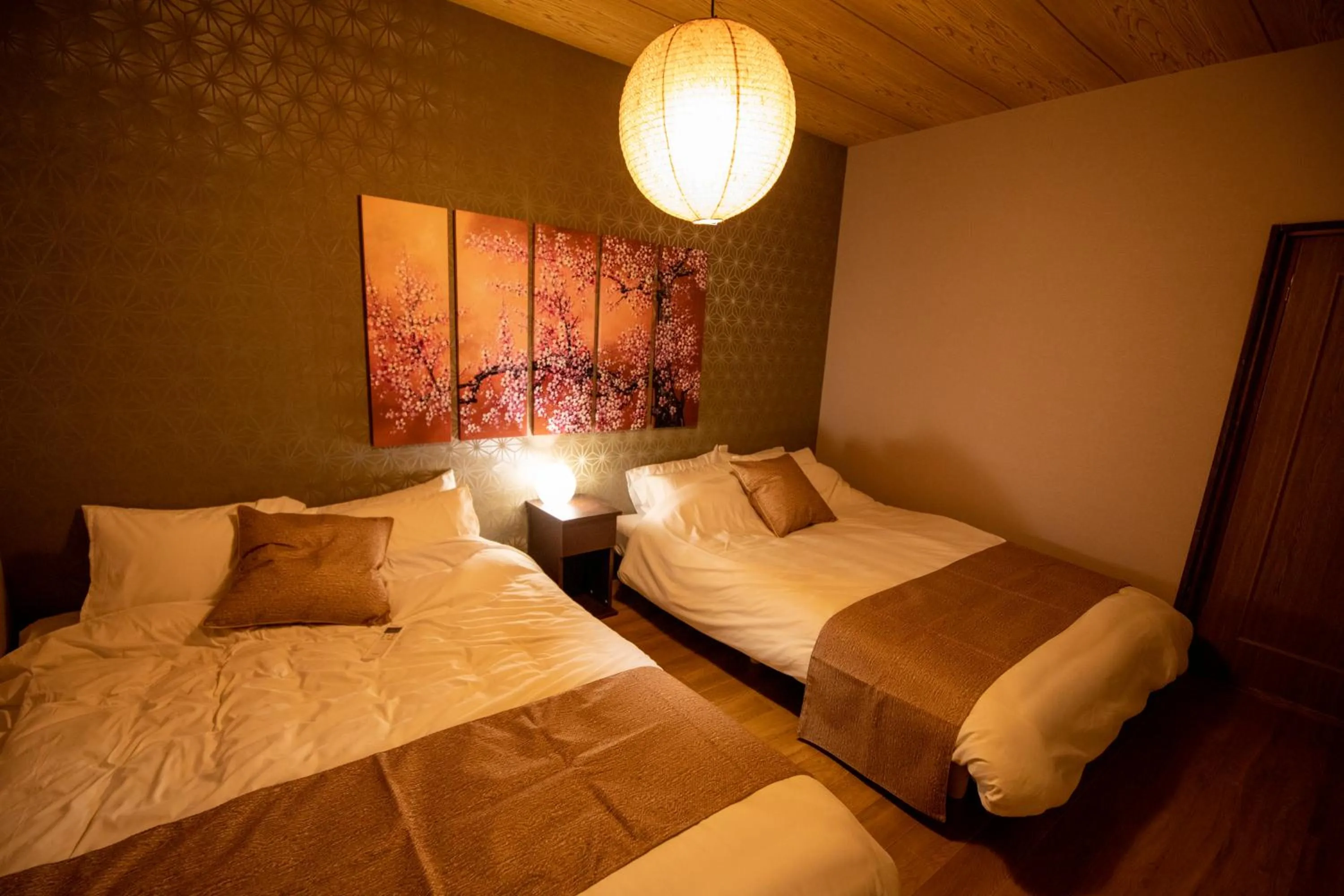 Bed in MON Kishinosato Sakura Resort -vacation rental-