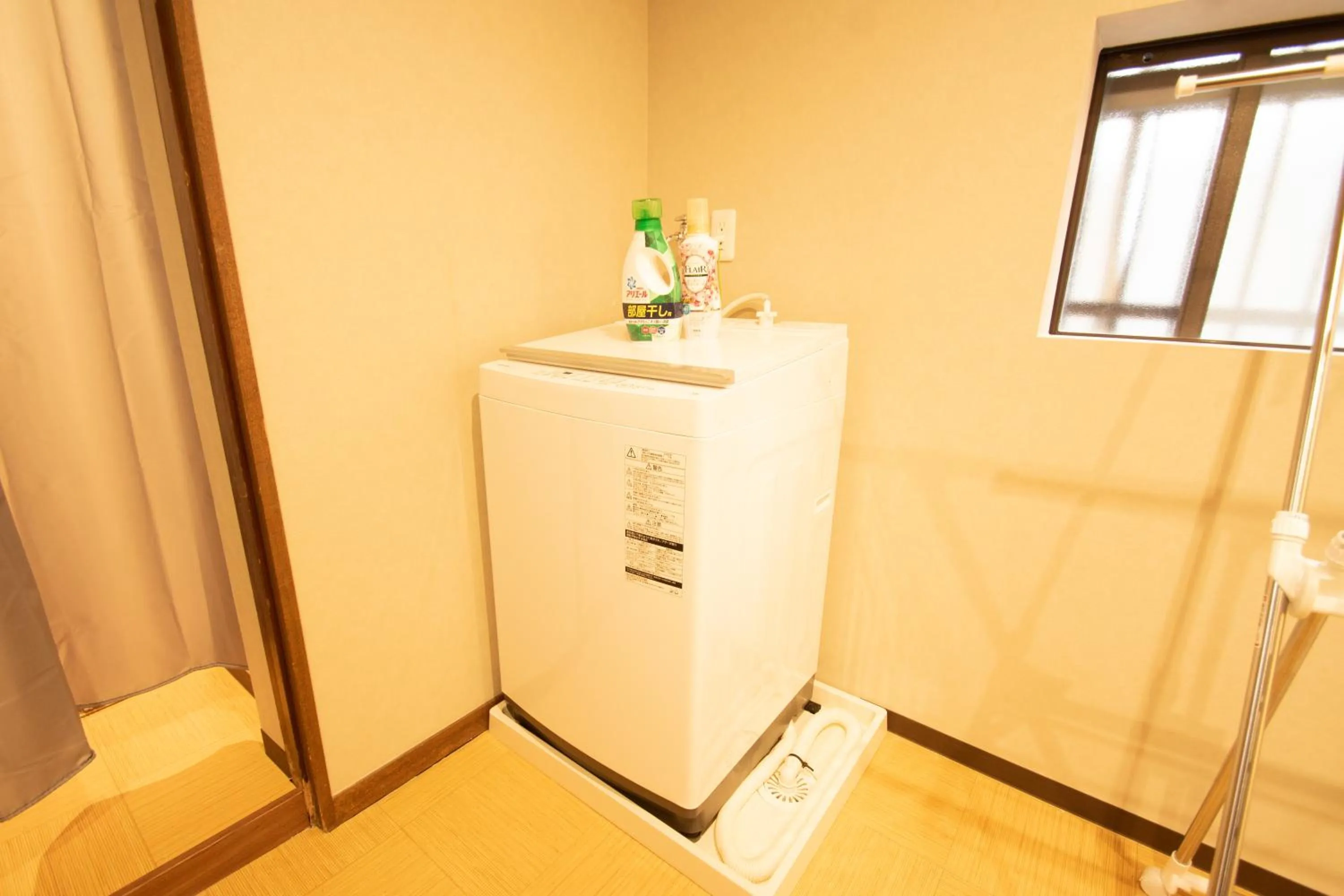washing machine in MON Kishinosato Sakura Resort -vacation rental-