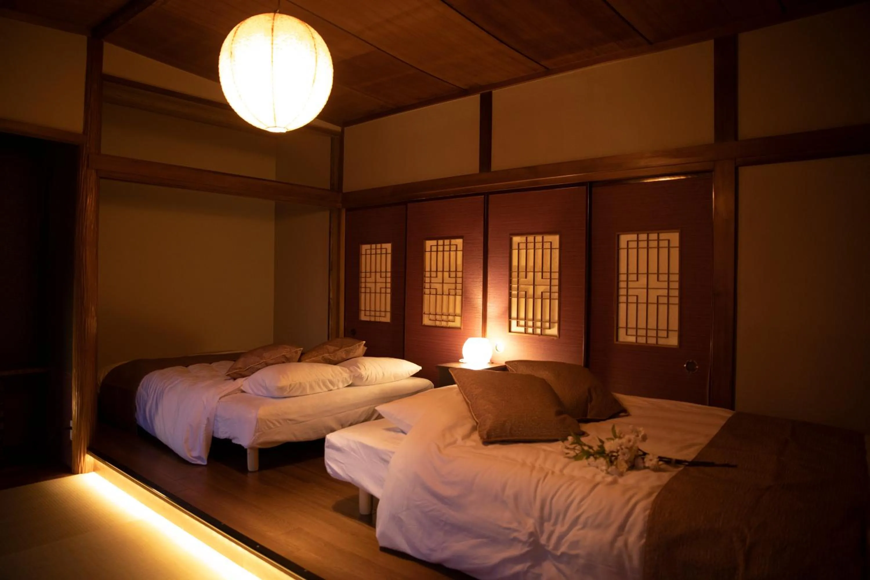 Bed in MON Kishinosato Sakura Resort -vacation rental-