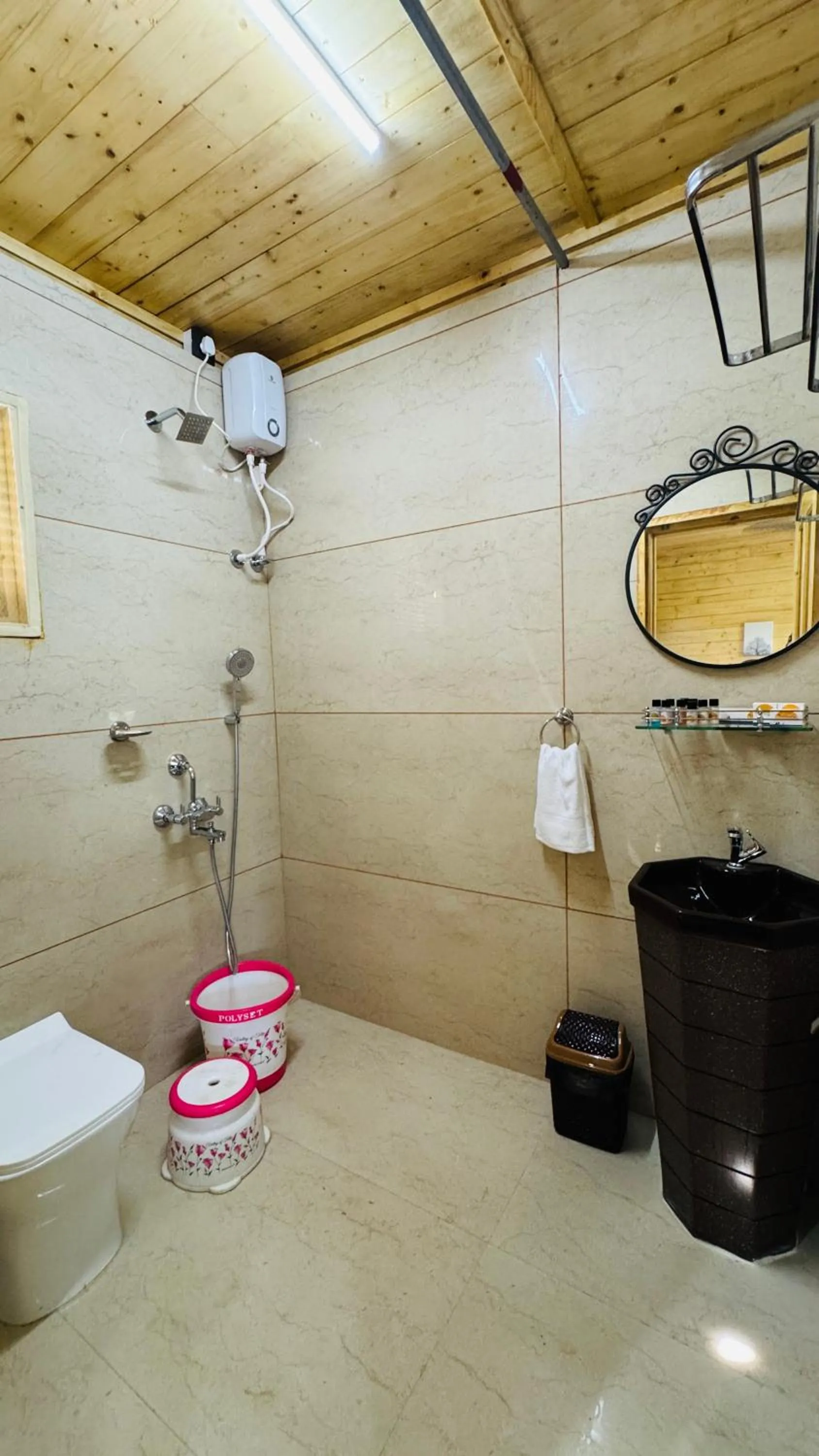 Shower in Coastal Bay Inn by Green Apple Stays